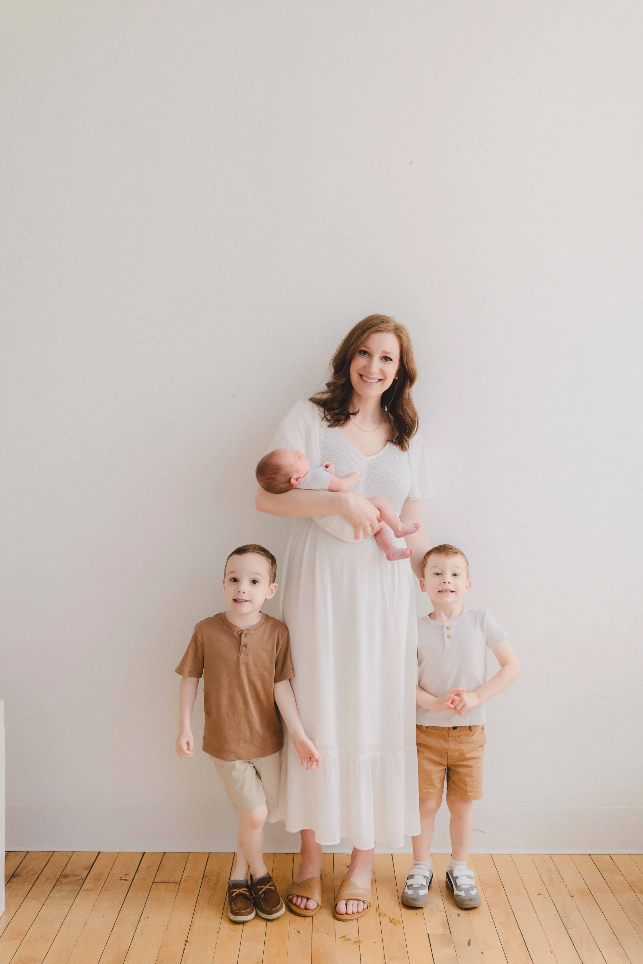 Cleveland Newborn Photography | Mom with Newborn and Big Brothers in Studio