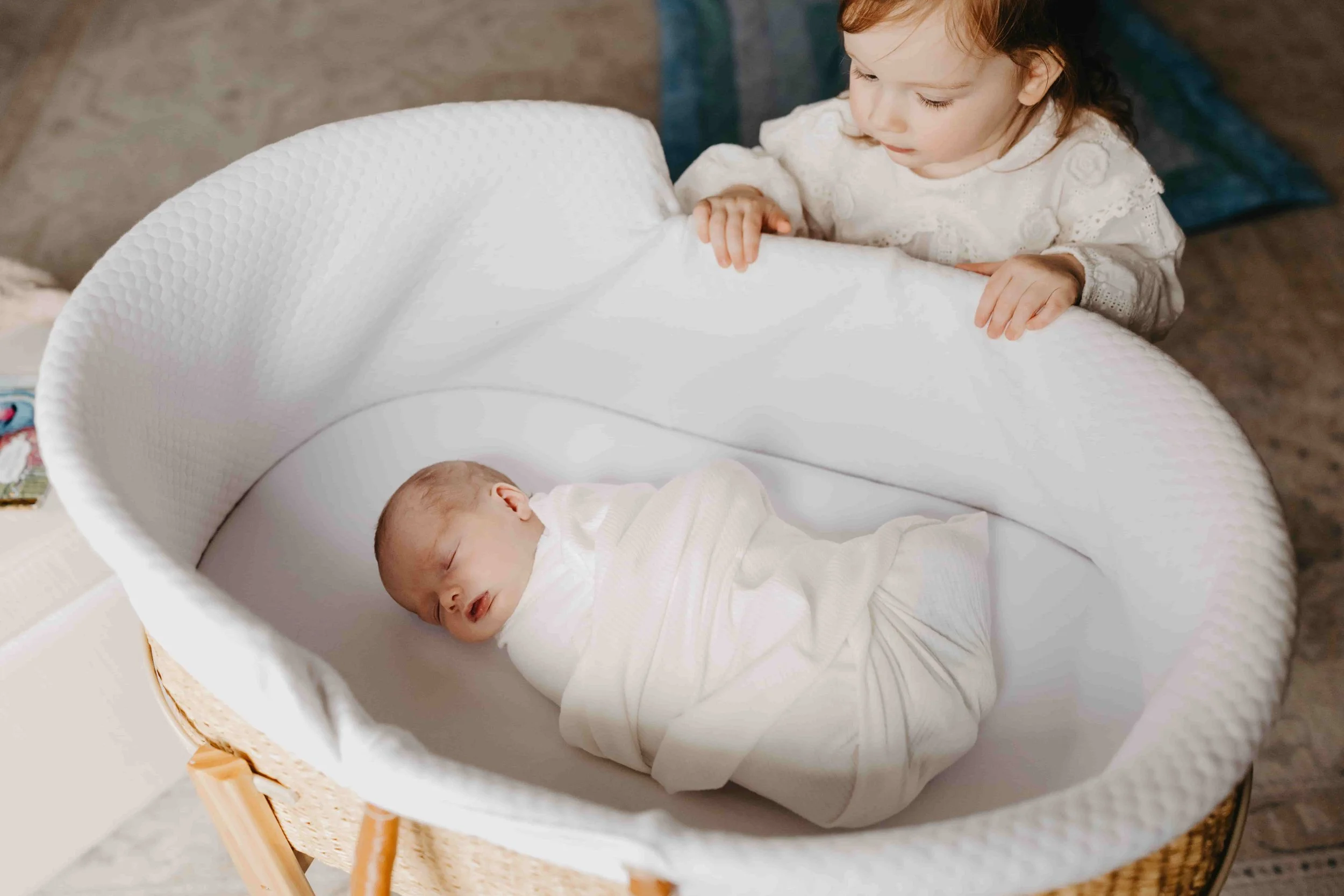 Lifestyle newborn photo in nursery Shaker Heights Ohio