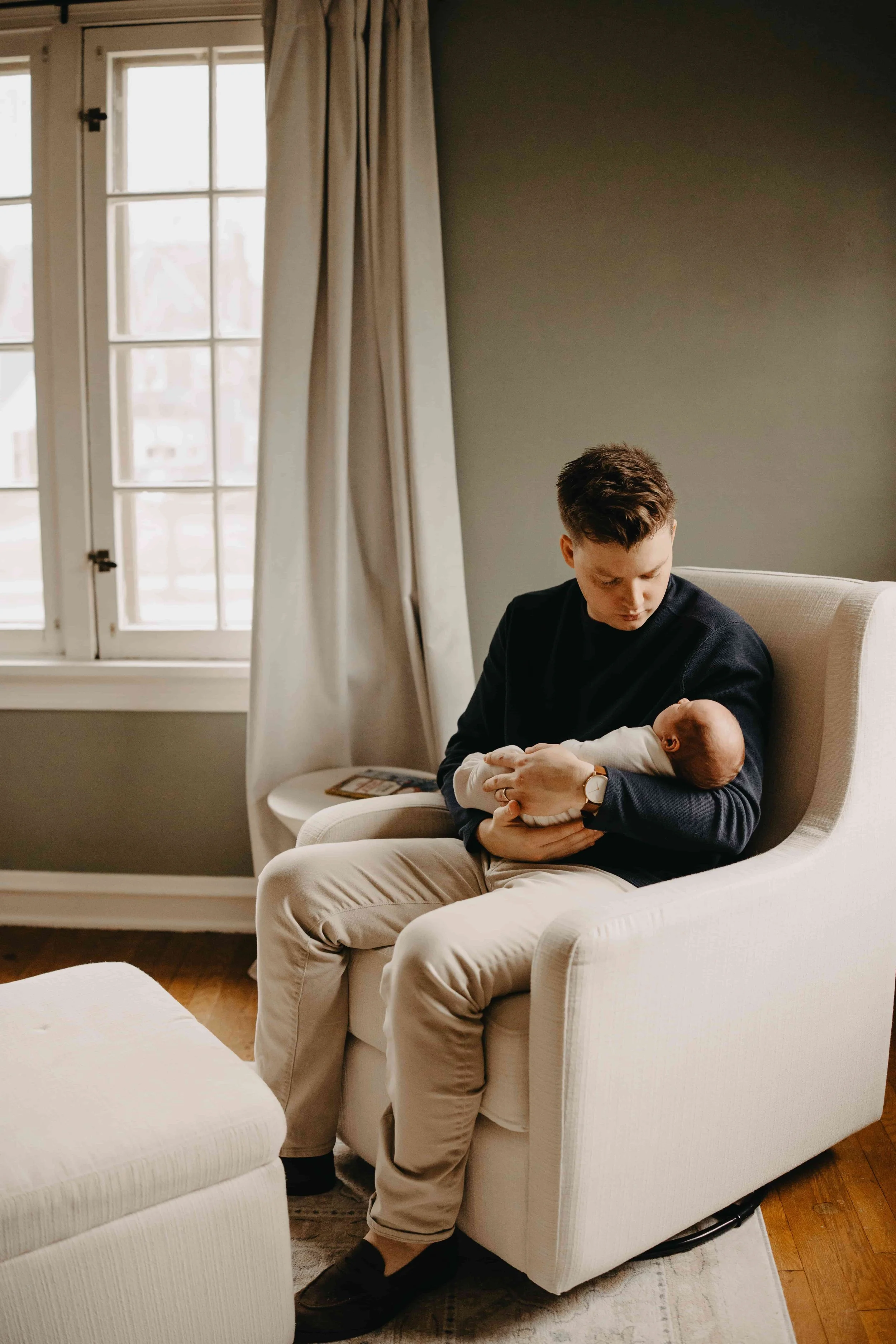 Cleveland family with newborn during in-home photography session