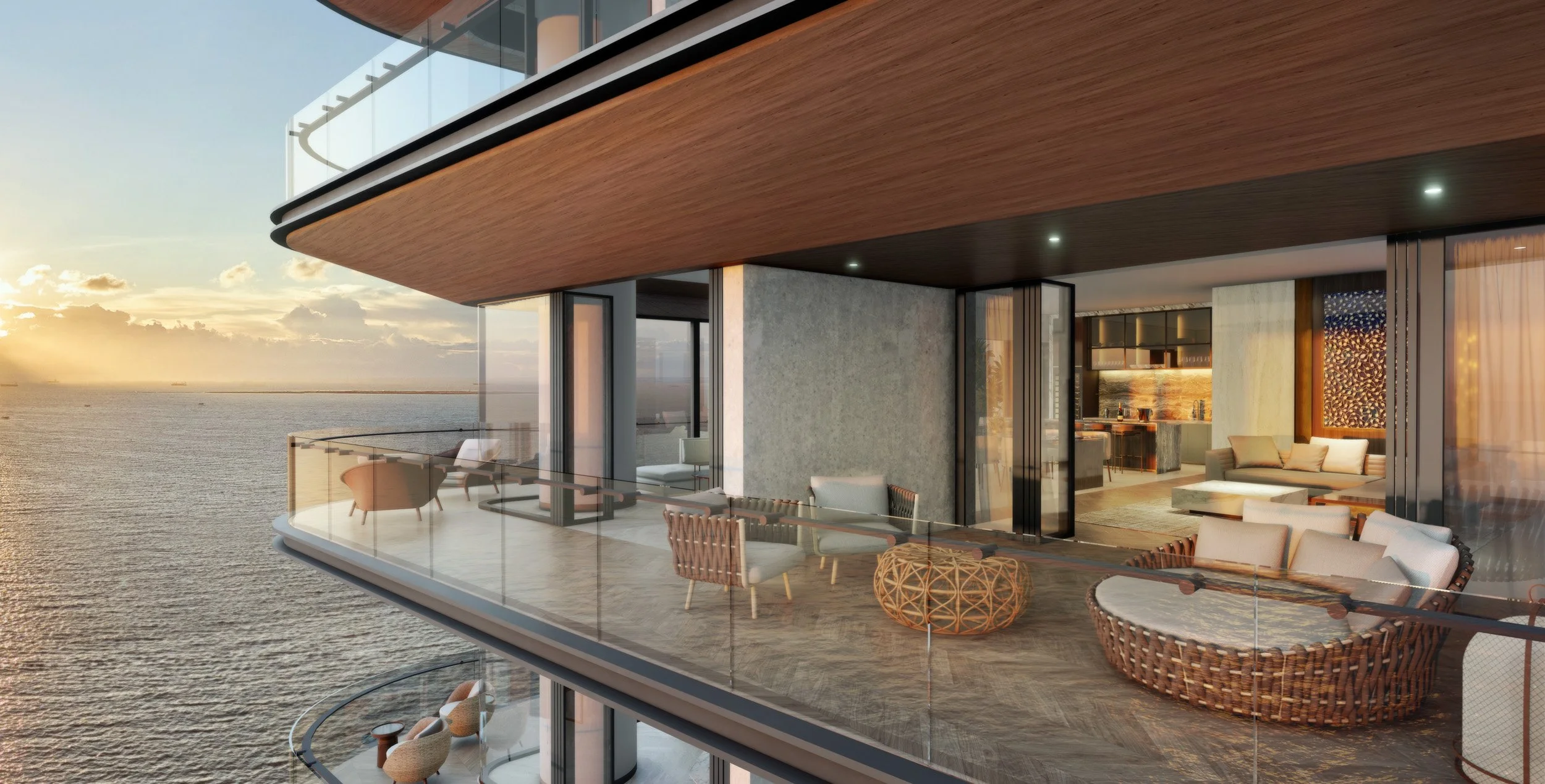 Luxury modern apartment balcony overlooking the ocean at sunset, featuring elegant outdoor chairs and wicker lounge seating — Global Wealth Interiors showcasing coastal sophistication and contemporary outdoor living.