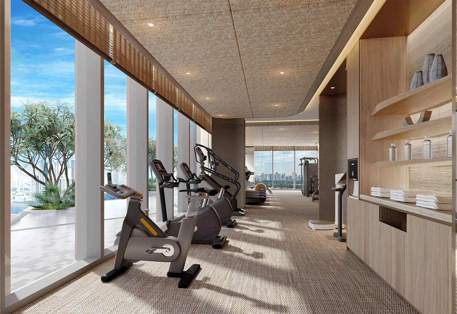 Modern gym with cardio equipment and floor-to-ceiling windows overlooking a panoramic city view — Global Wealth Interiors showcasing wellness-driven design and contemporary luxury living.