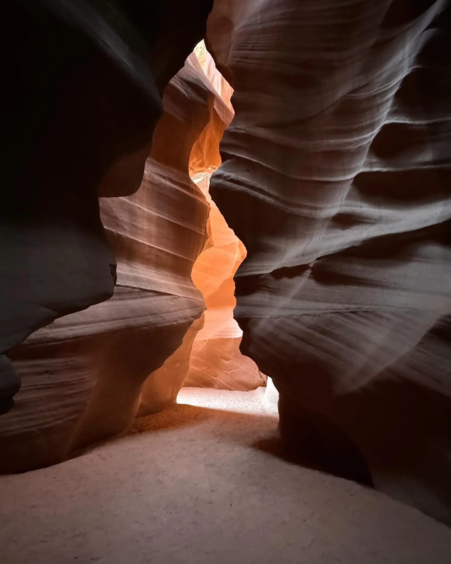 In the heart of Arizona's rugged terrain lies a place that whispers ancient secrets and paints a masterpiece of nature's wonders - Antelope Canyon.
As you wander through these sandstone passages, you can't help but feel the weight of history and hol