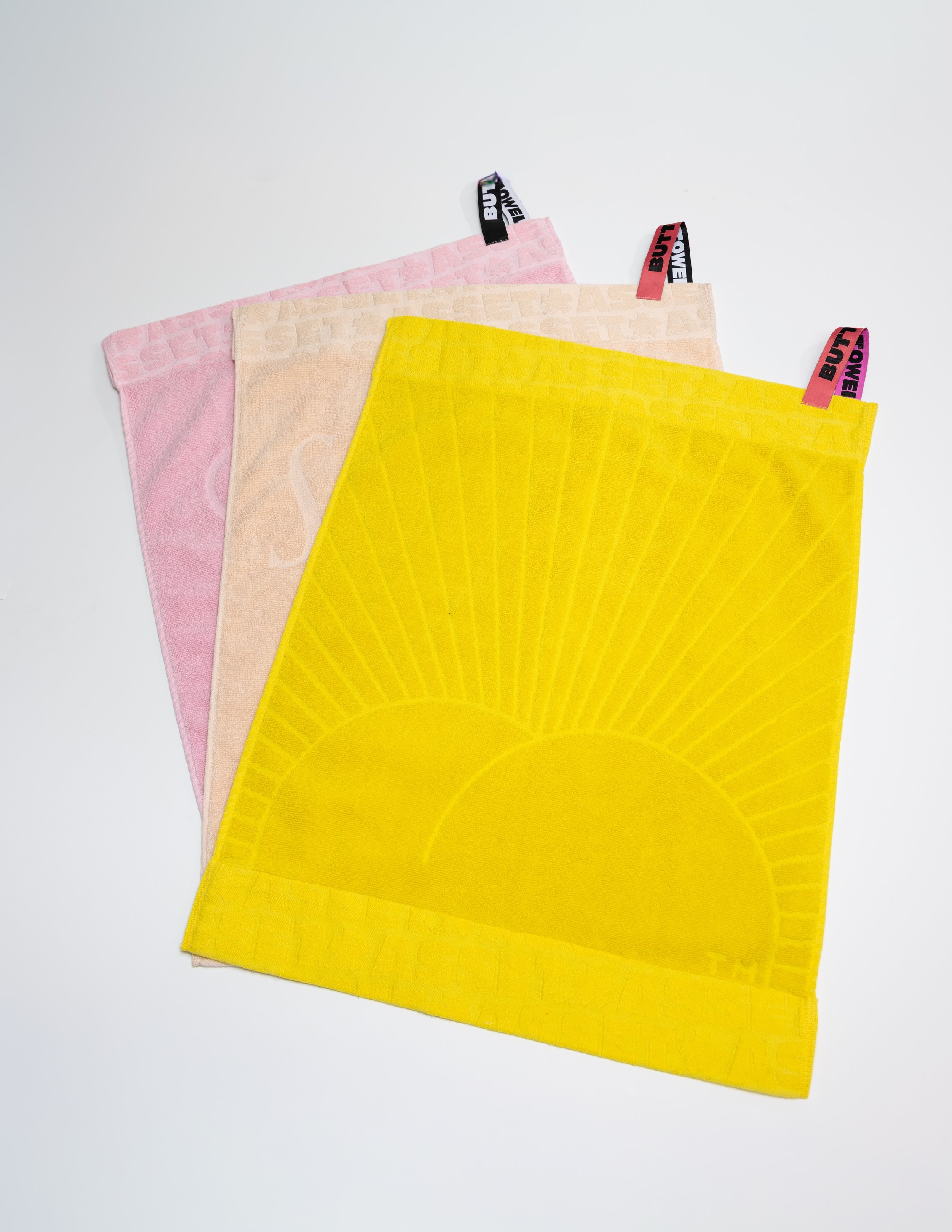 Colorful towels product photography in a studio by Portland, Oregon product photographer, JP Bogan. PDX Product Photography at SumSum Productions studio.