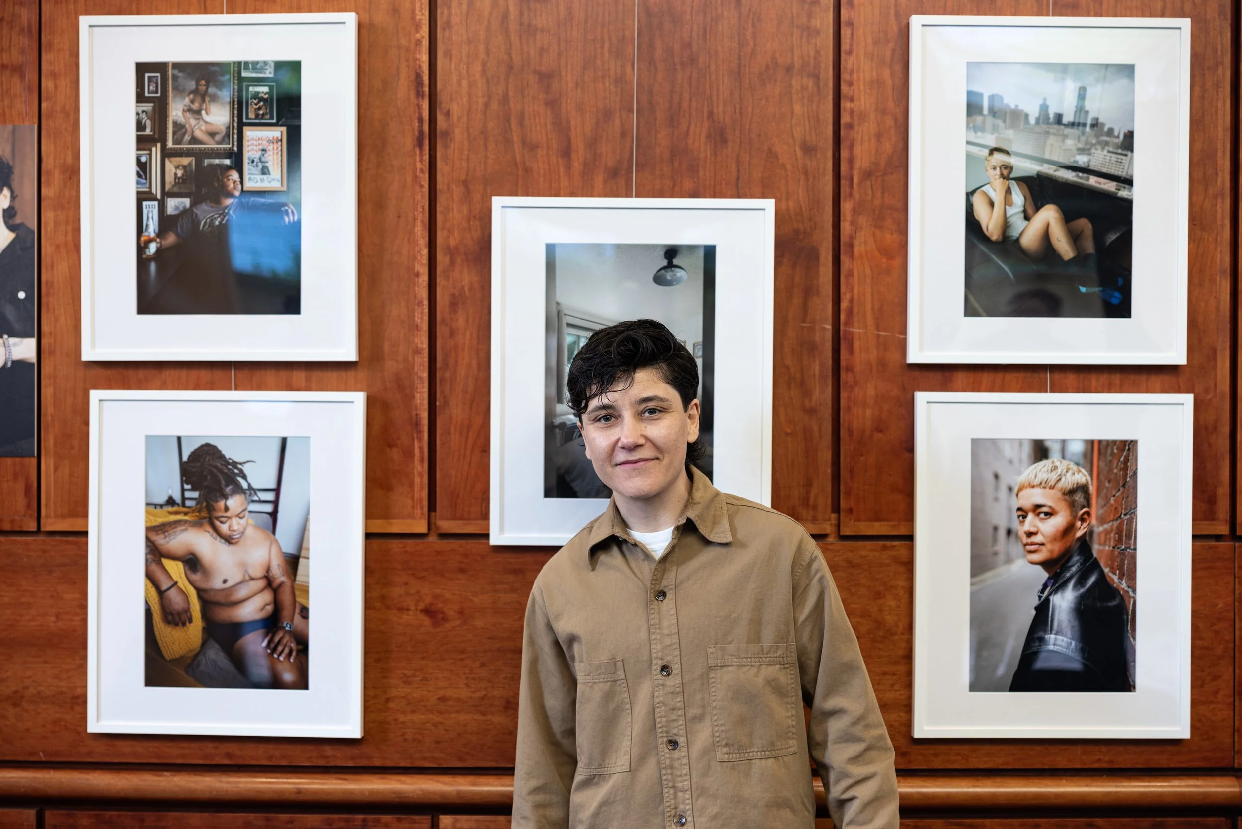 Esther posing at exhibition at Framing Our Presence event at Portland 5 Winningstad Theater in Portland, Oregon. Event Photography bu JP Bogan.