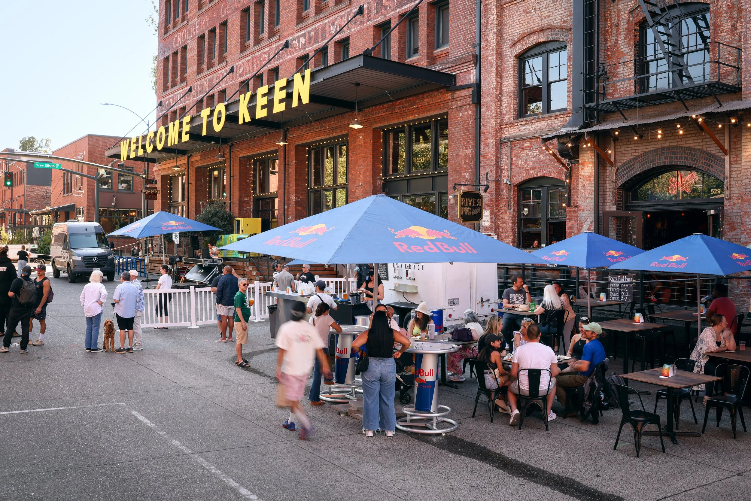 People walking around and enjoying the Pearl Summer Party in downtown Portland, OR.