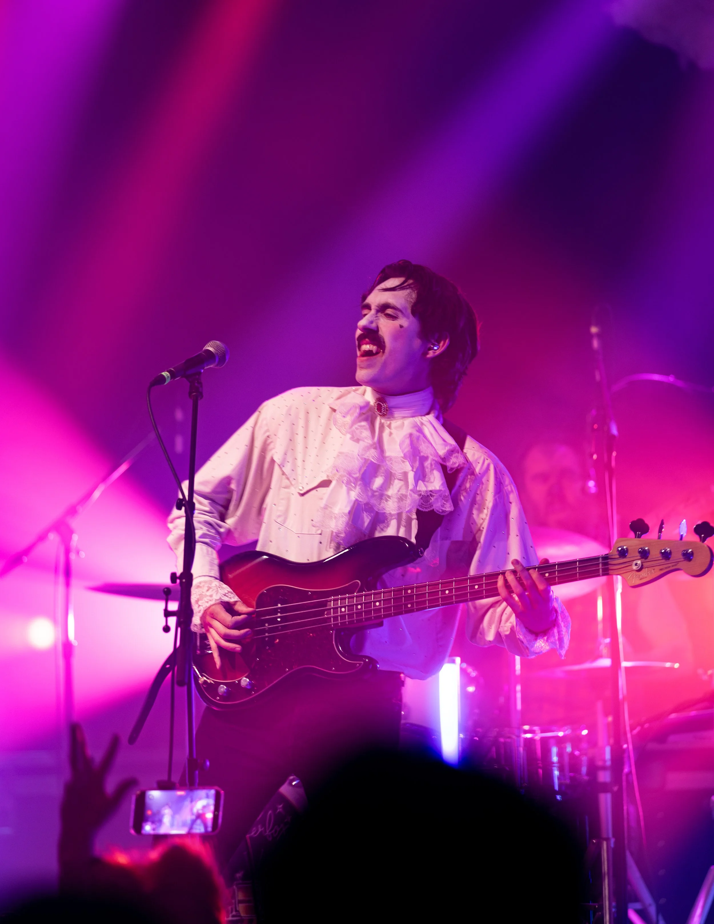 Concert photography of Glitterfox bass player at Aladdin Theater in Portland, Oregon on Halloween night in 2025.