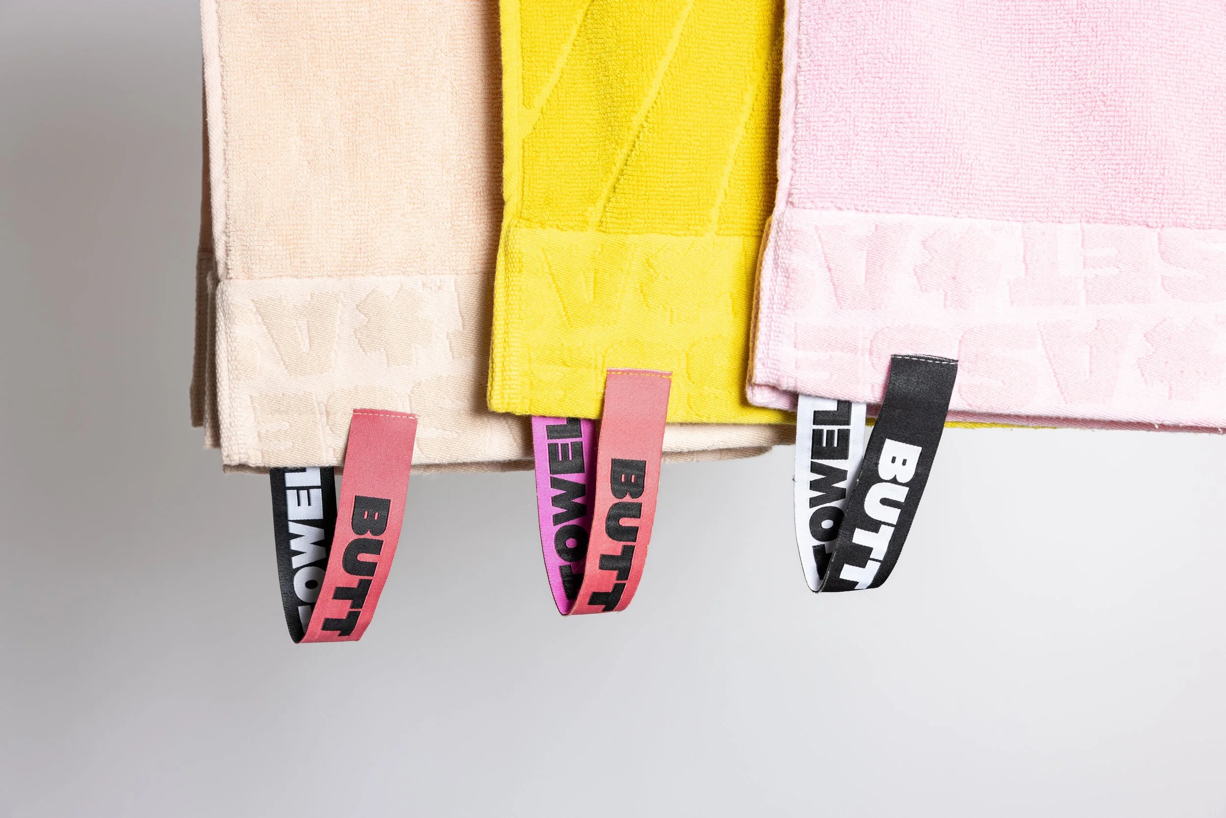 Colorful towels product photography in a studio by Portland, Oregon product photographer, JP Bogan. PDX Product Photography at SumSum Productions studio.