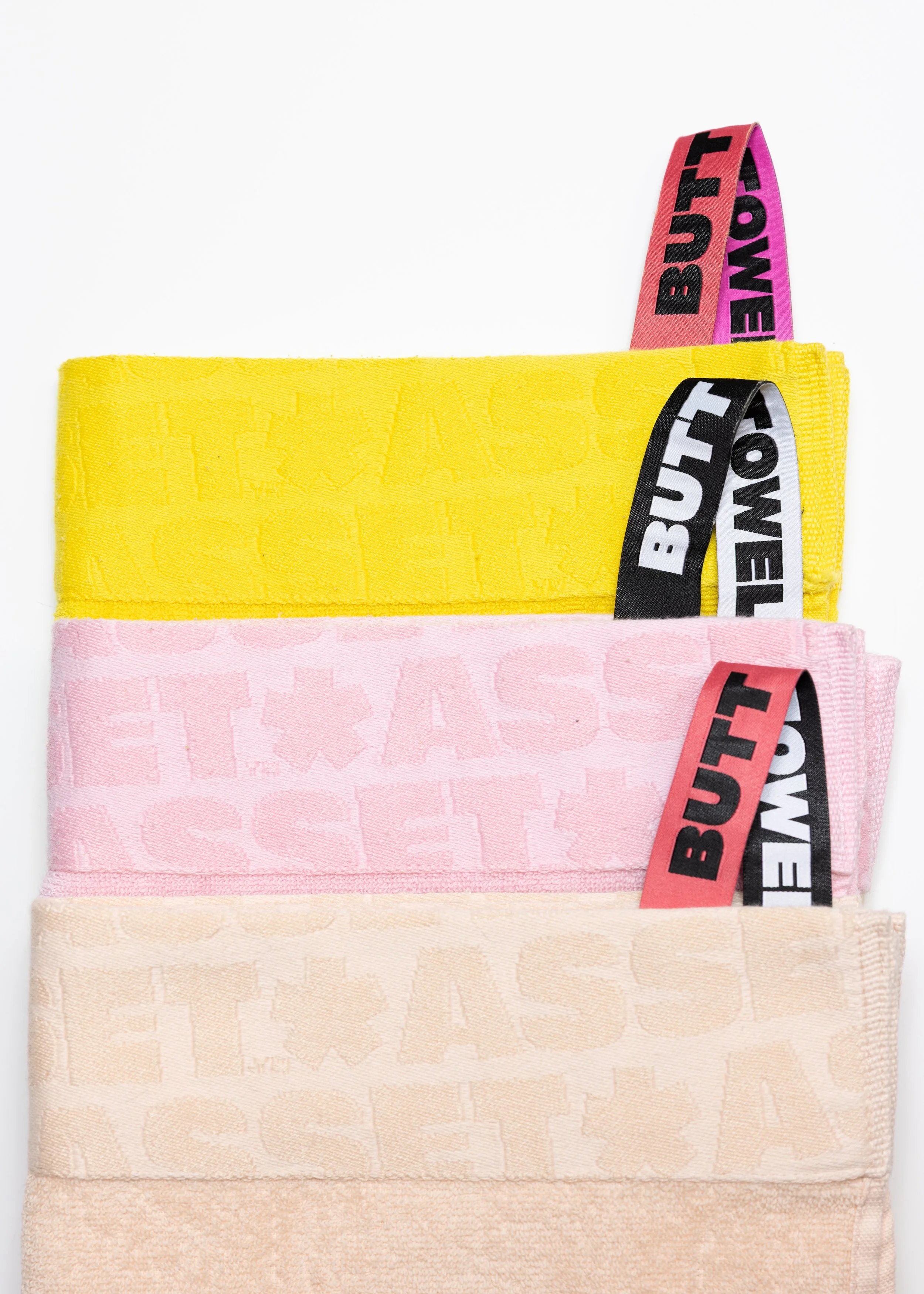Colorful towels product photography in a studio by Portland, Oregon product photographer, JP Bogan. PDX Product Photography at SumSum Productions studio.
