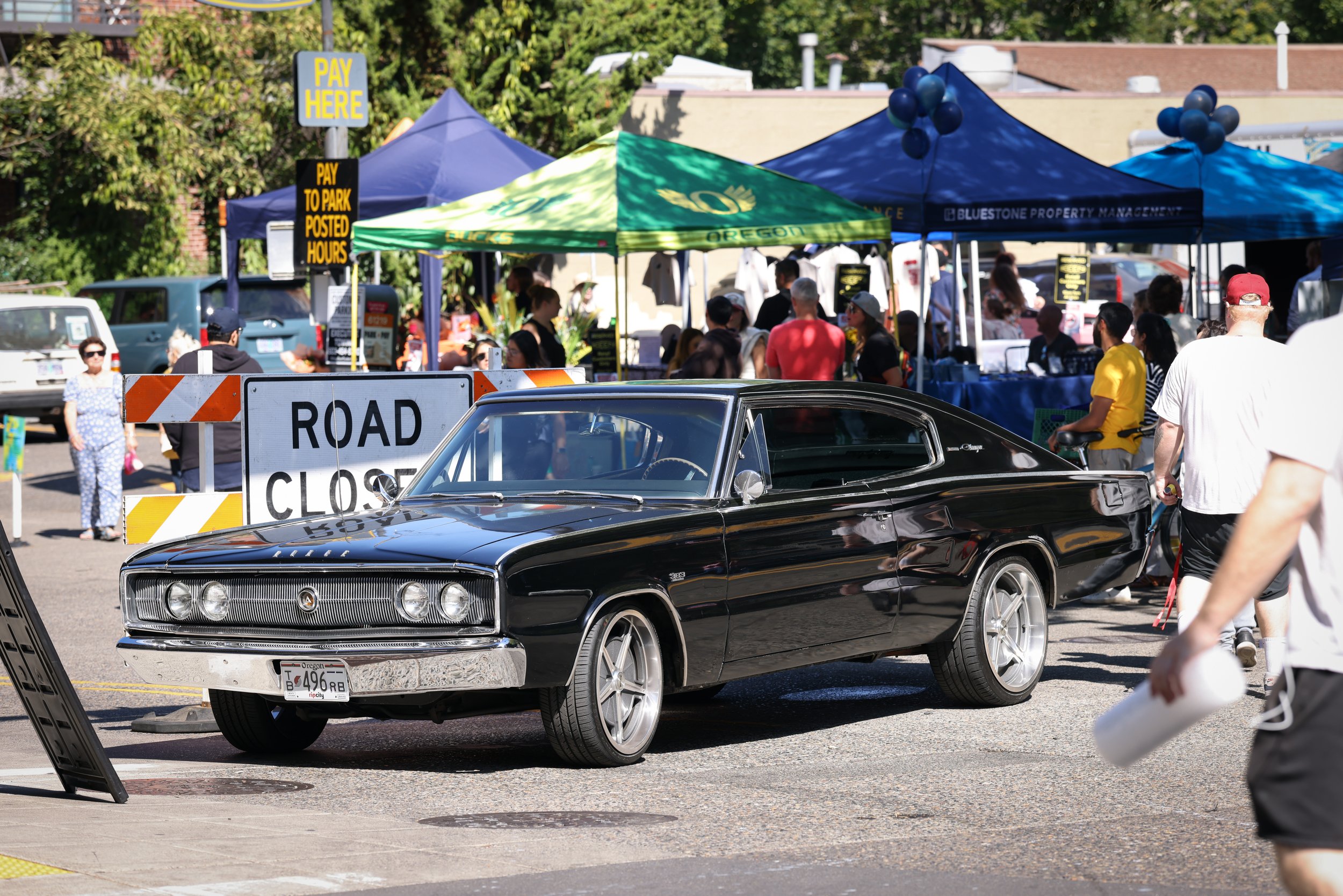 A classic car parked out front at the Pearl Summer Party in downtown Portland, OR.