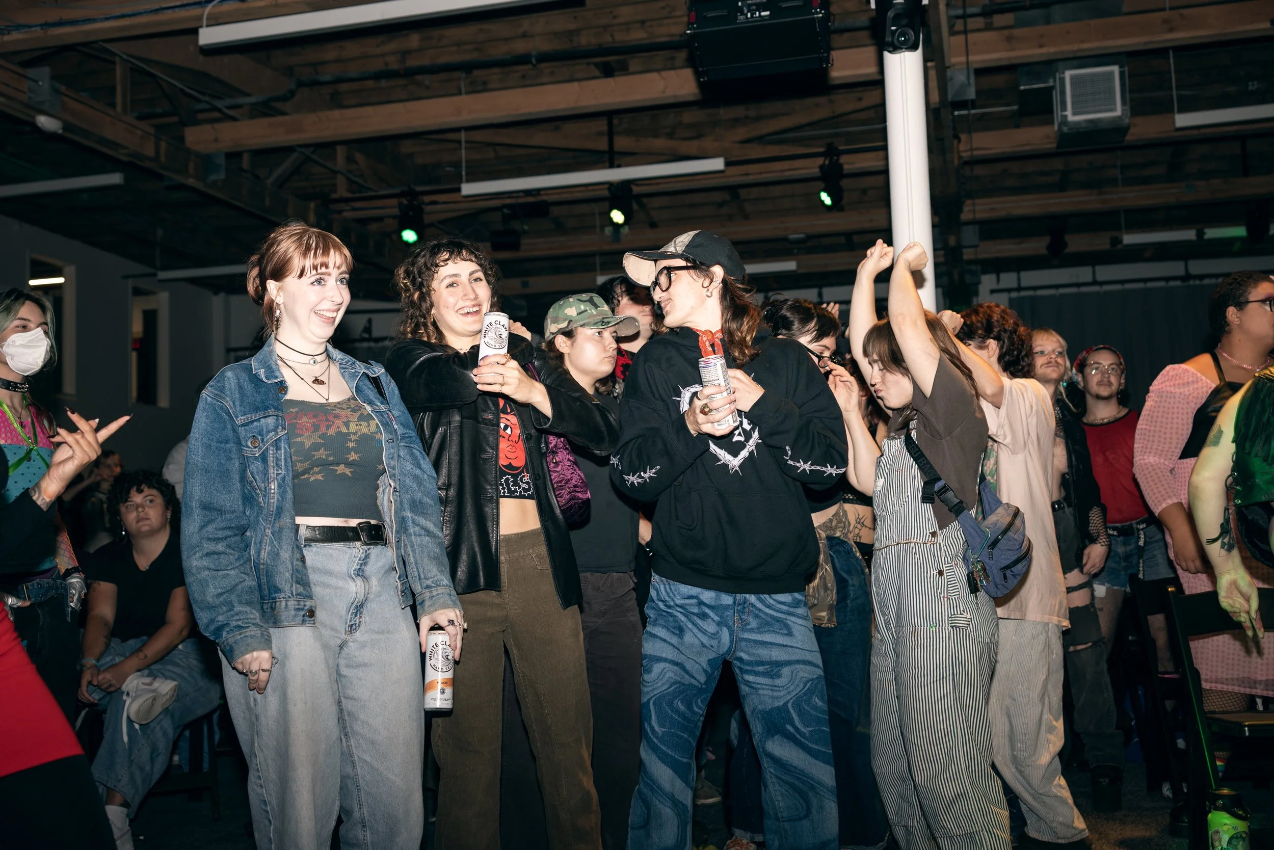 The crowd smiling and having fun at TBOY Wrestling in Portland, OR.