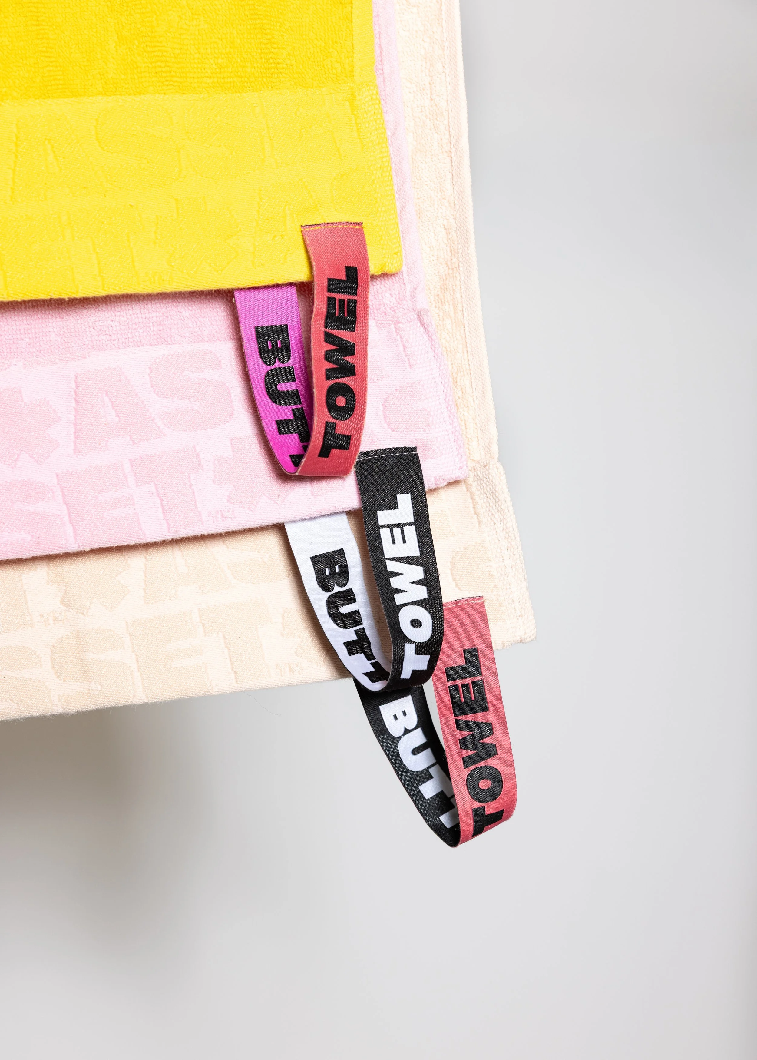 Colorful towels product photography in a studio by Portland, Oregon product photographer, JP Bogan. PDX Product Photography at SumSum Productions studio.