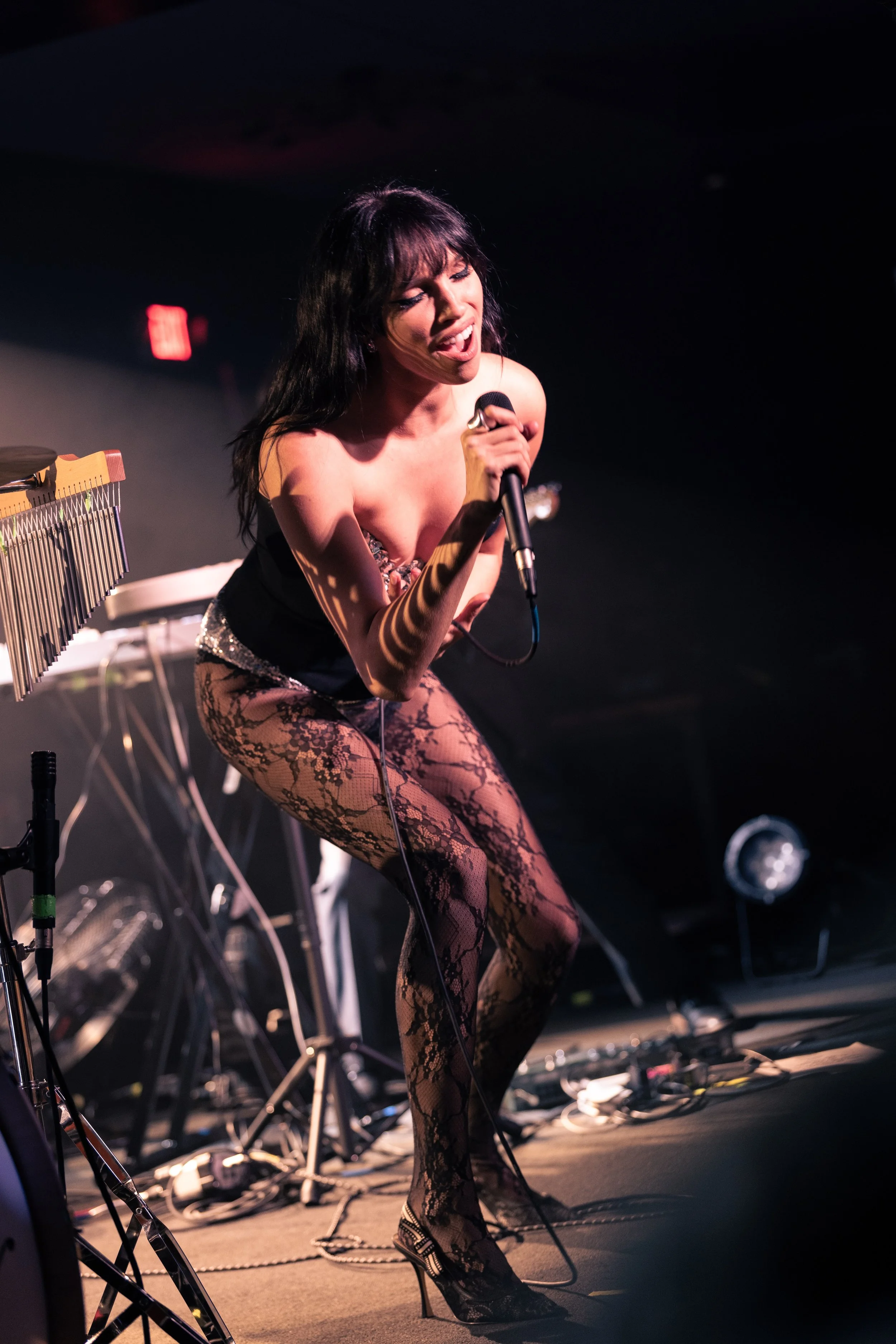 Concert photography of glamorous Syd Taylor performing on tour at The Get Down music venue in Portland, OR. 