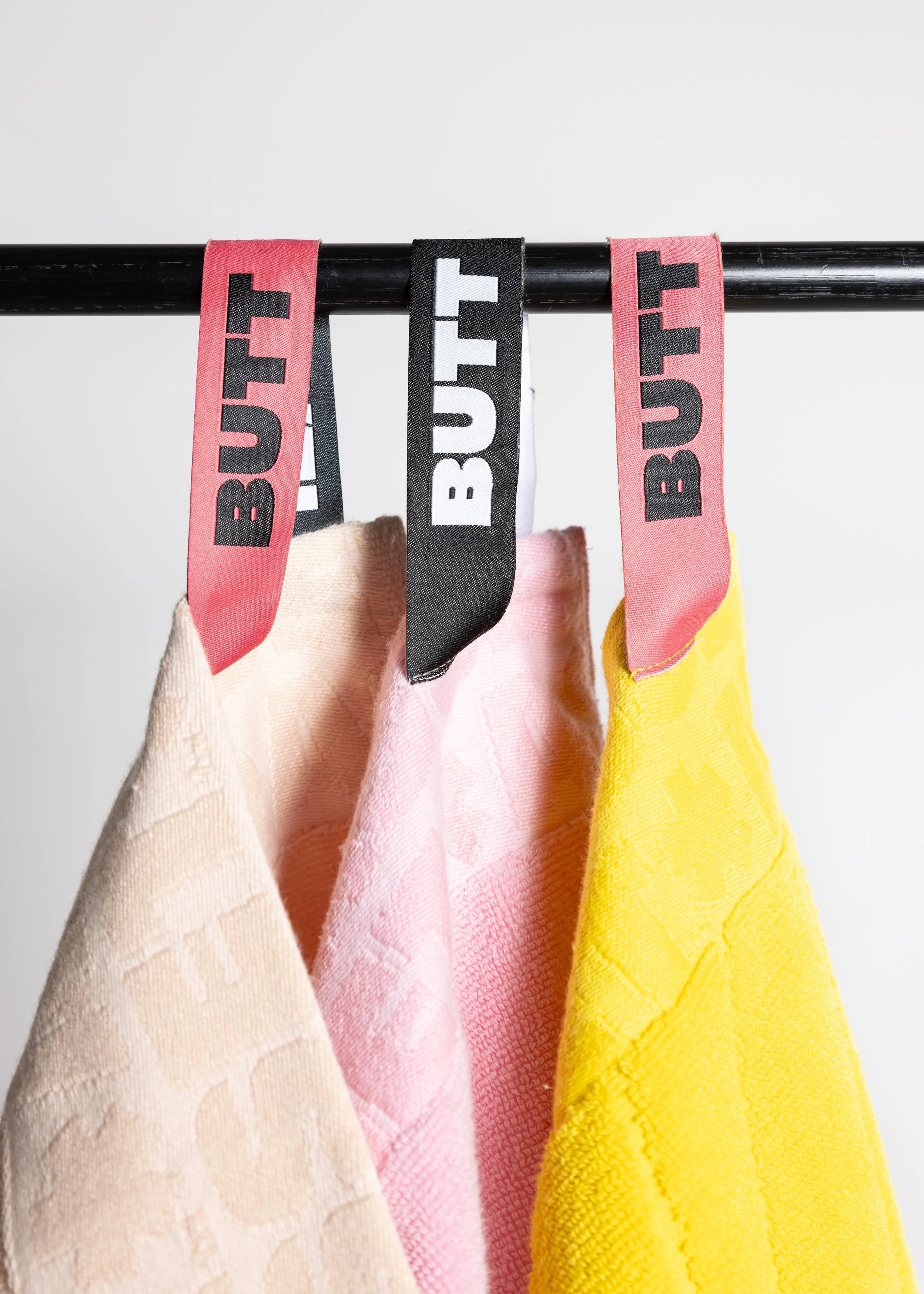 Colorful towels product photography in a studio by Portland, Oregon product photographer, JP Bogan. PDX Product Photography at SumSum Productions studio.