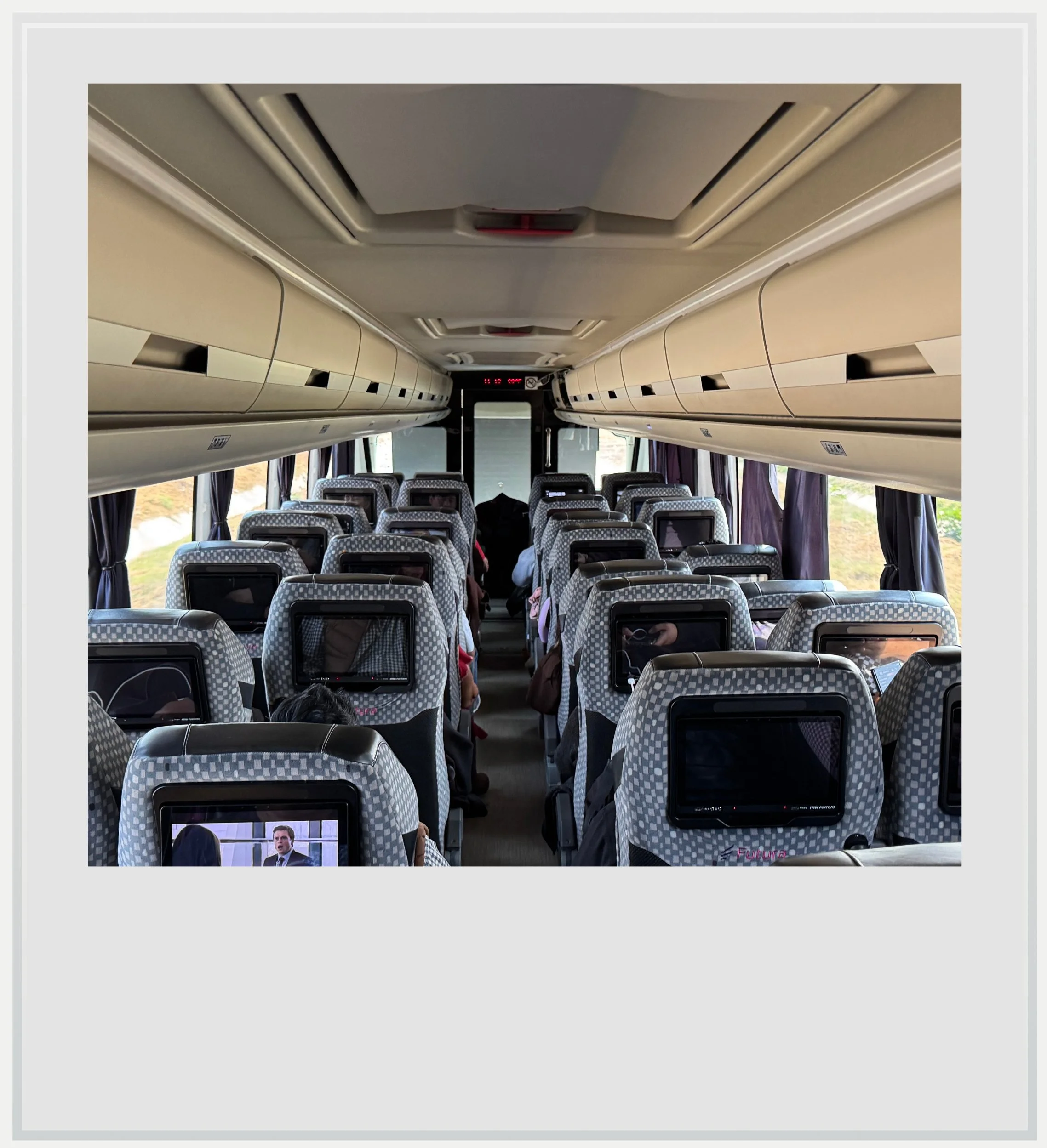 Inside a Futura Primera Select bus.