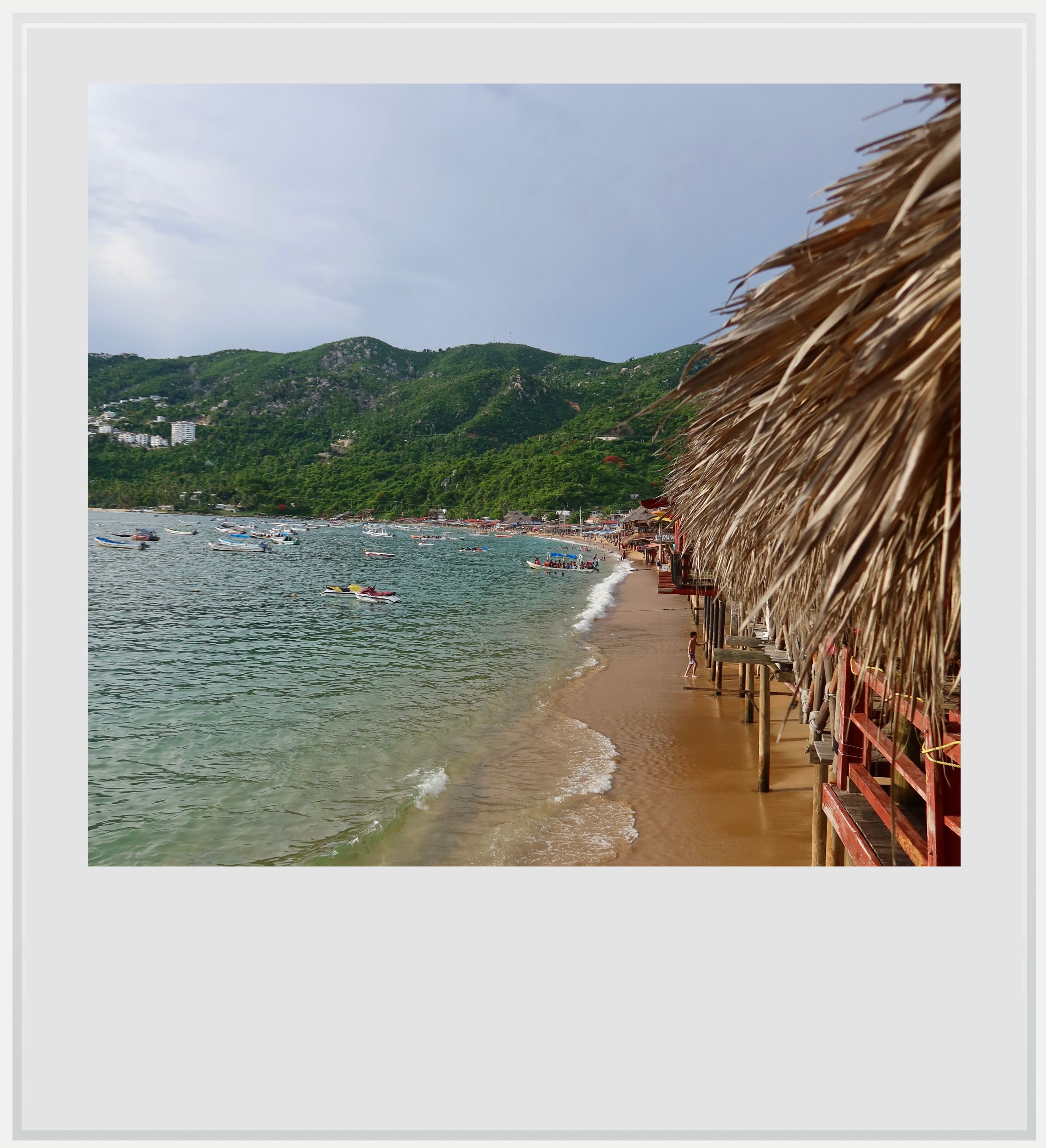 Restaurants on the beach at Playa Puerto Marques in Acapulco.