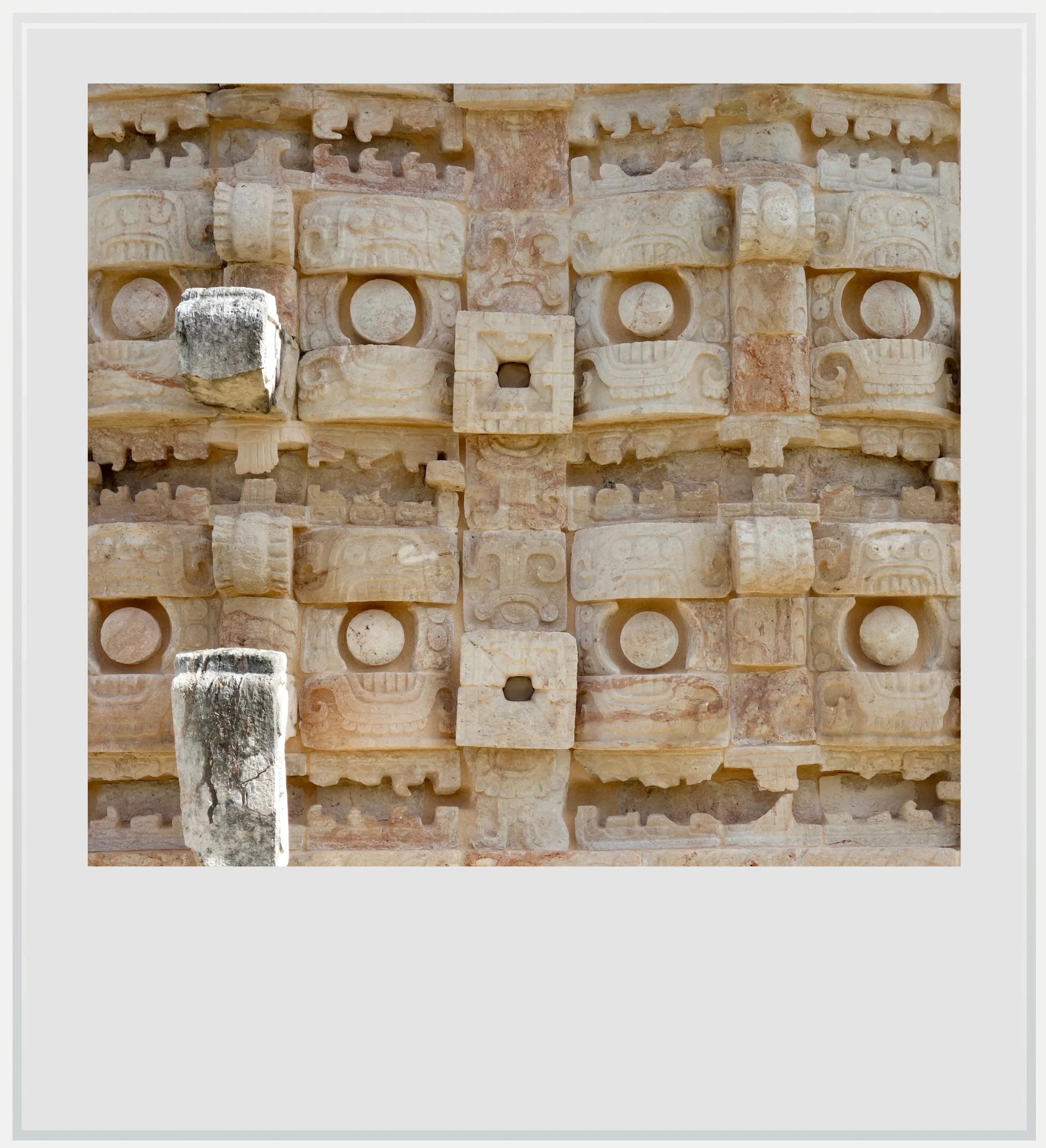 A detailed view of the Chaac masks on the western façade of the Palace of the Masks in Kabah, Yucatan, Mexico.