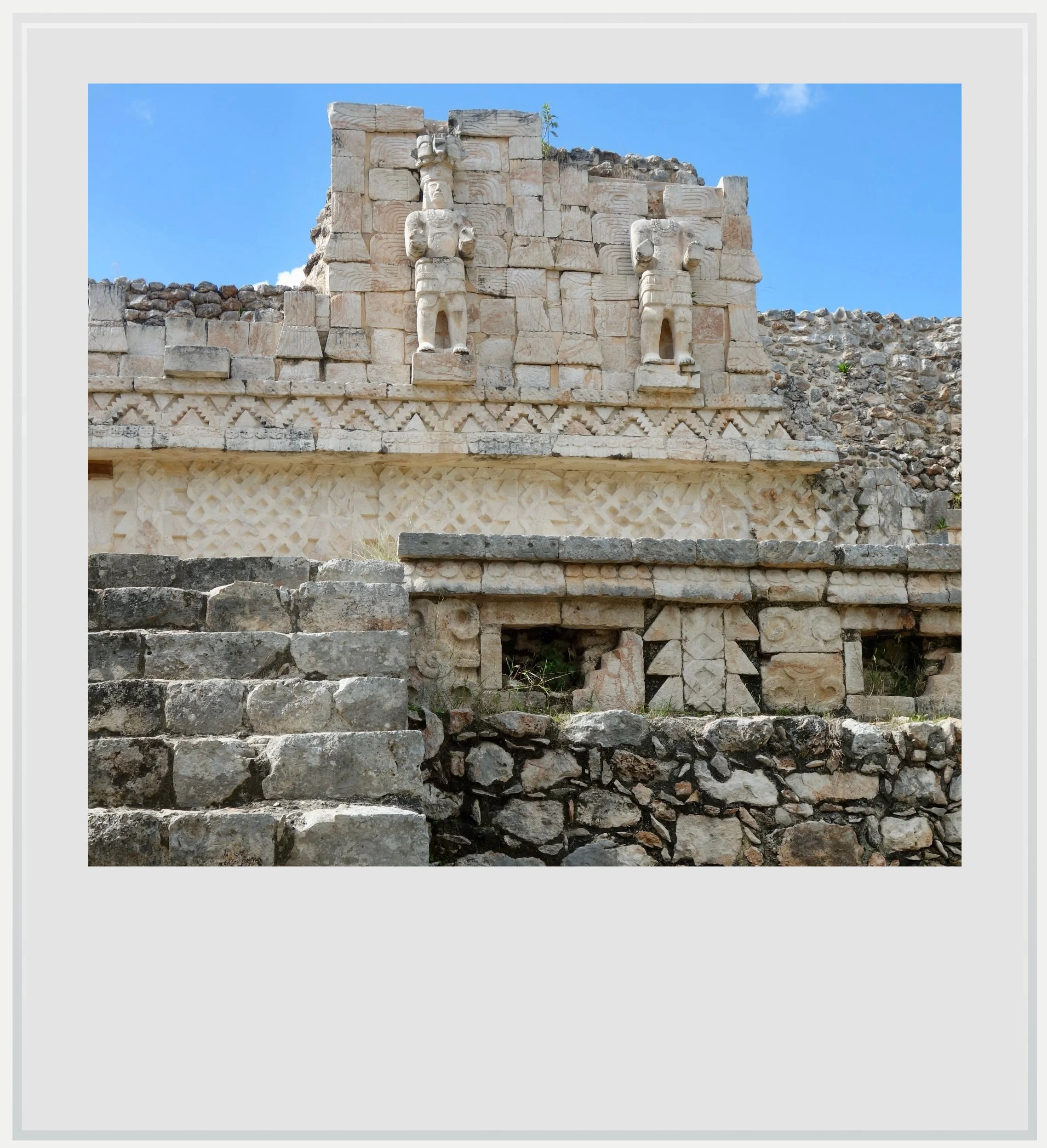 Human figures on the eastern façade of the Codz Pop in kabah, Yucatan, Mexico.
