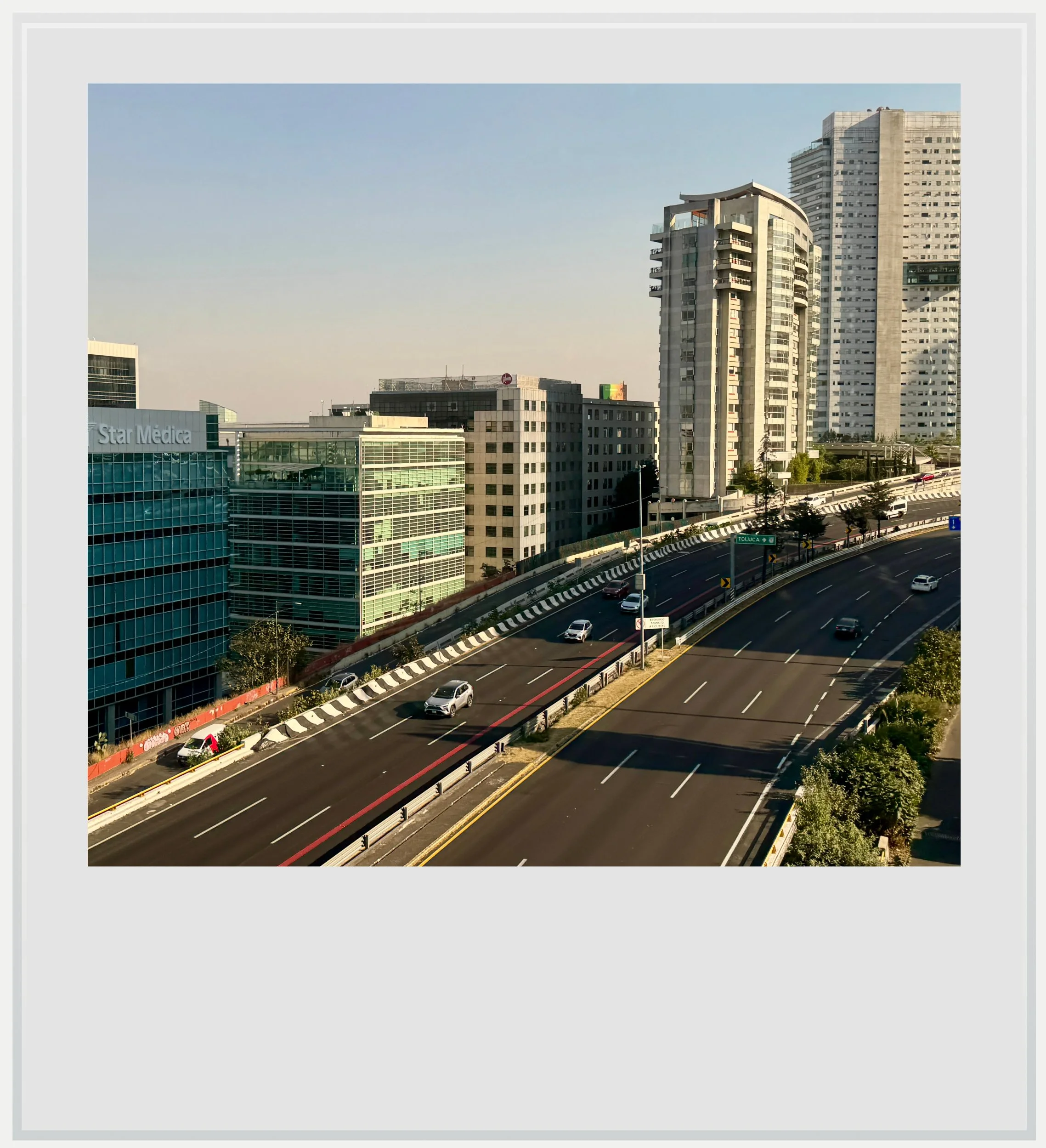 The modern urban landscape of Santa Fe from the Insurgente train, in Mexico.