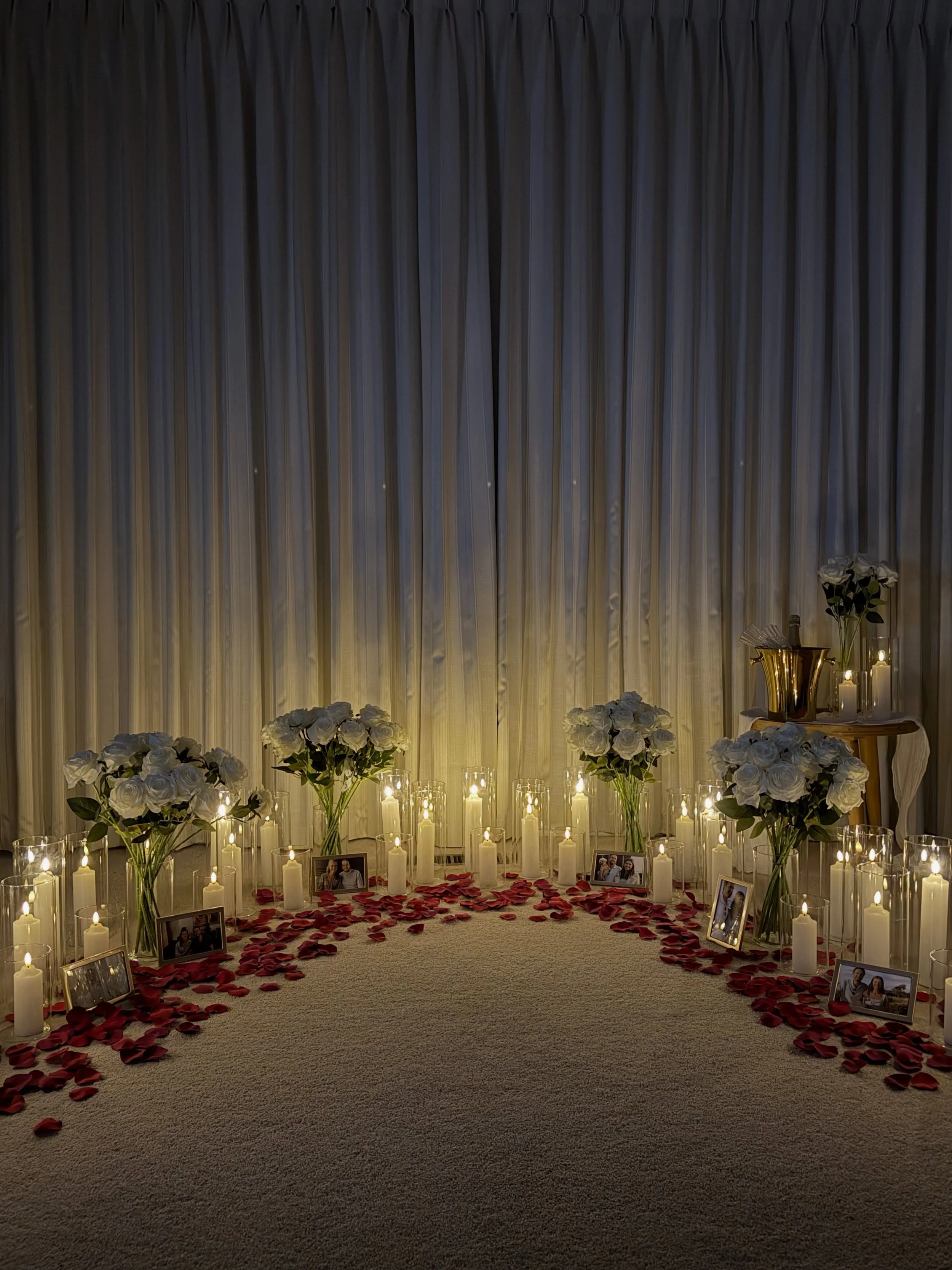 Introducing our Candlelight Love Story Proposal Package ✨🤍

This beautifully styled proposal setting, featuring the warm glow of candles and your favourite photos together. It&rsquo;s the perfect way to celebrate your love and begin your next chapte