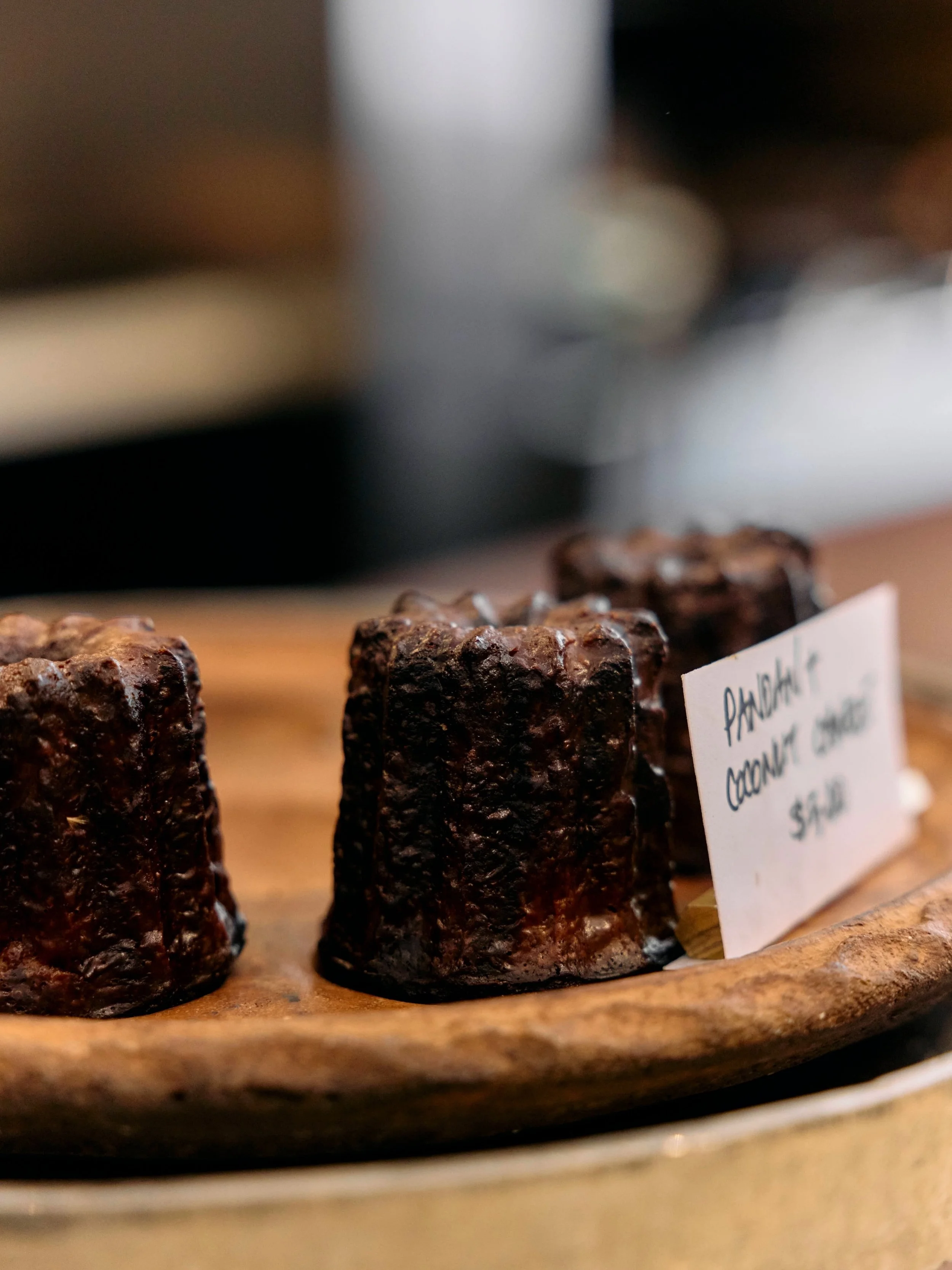 Canel&eacute;s were originally created by French nuns as a way to use up egg yolks left over from local wine production.⁠
⁠
Our take builds on that history, adding pandan and coconut to give the Bordelais pastry a Southeast Asian edge.⁠
⁠
Baked on-si