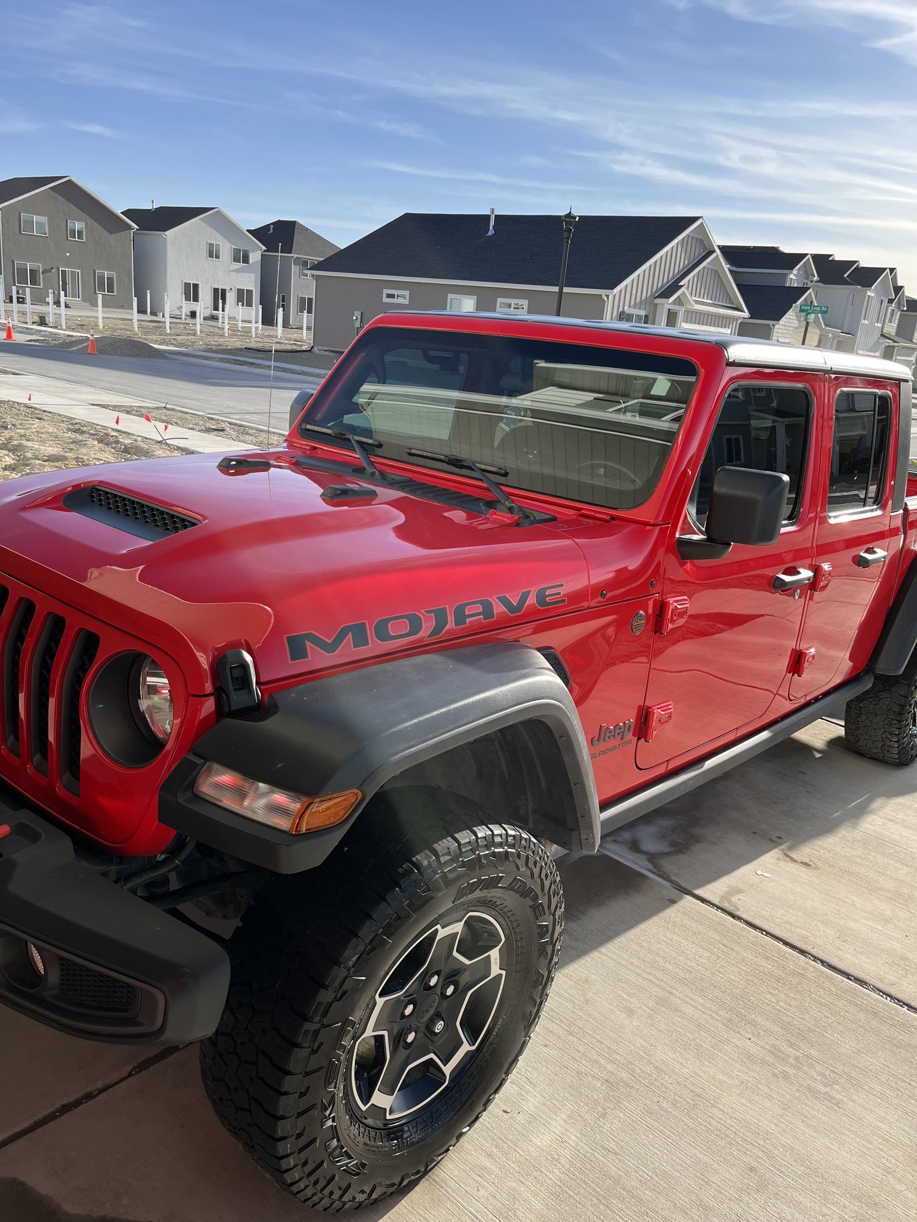 Red Jeep Gladiator Mojave never missing its maintenance details.