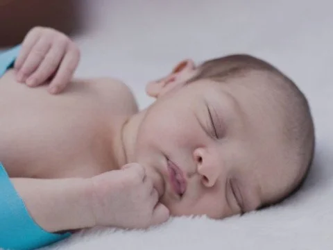newborn-baby-sleeping-480.jpg