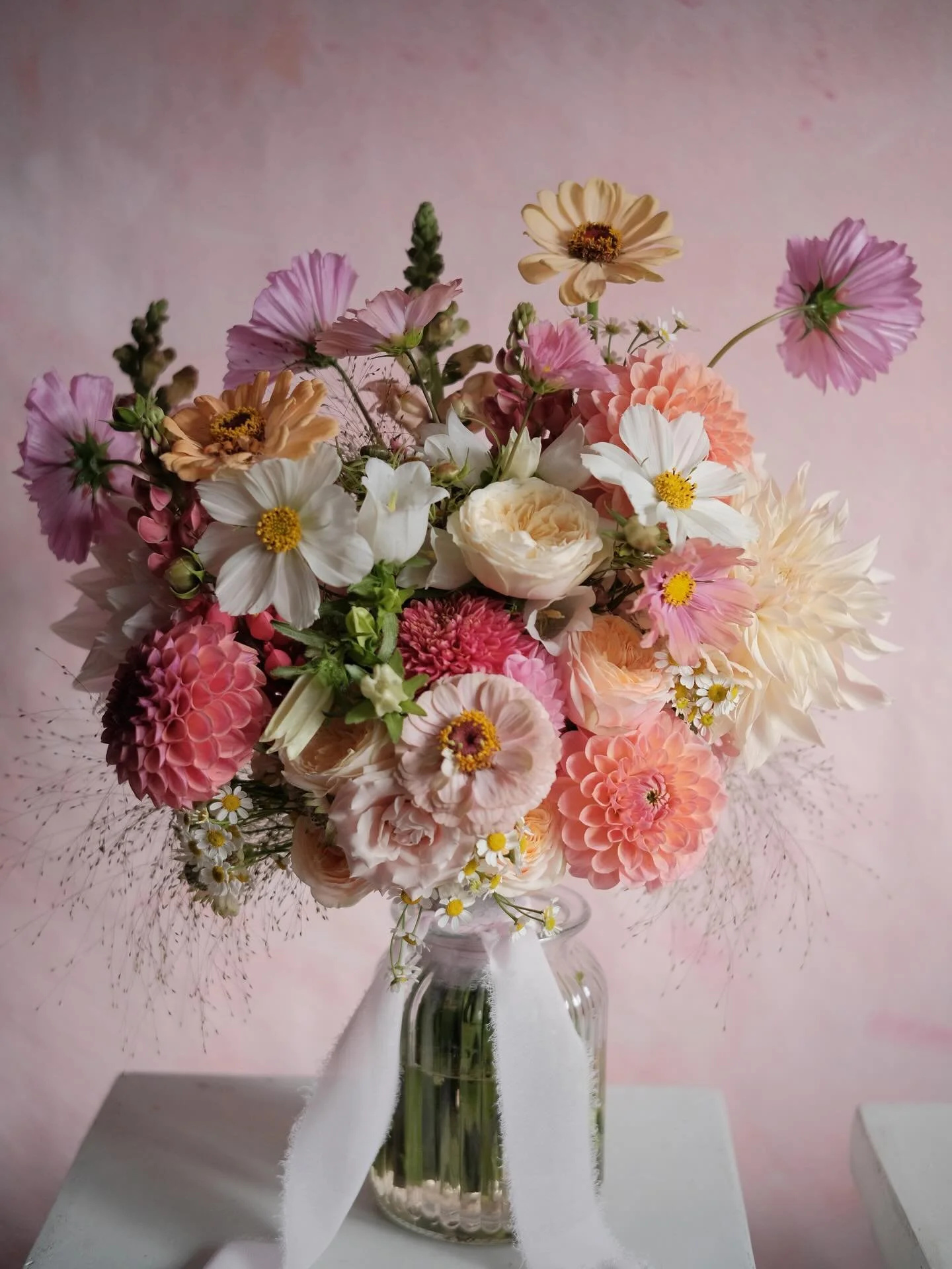On a rainy Friday looking back at this gorgeous bright summertime bouquet for Rachel. 

An extra special bouquet for this stunning bride using her own home grown Dahlias. It was such a joy to create florals for this local wedding in my home town. Con