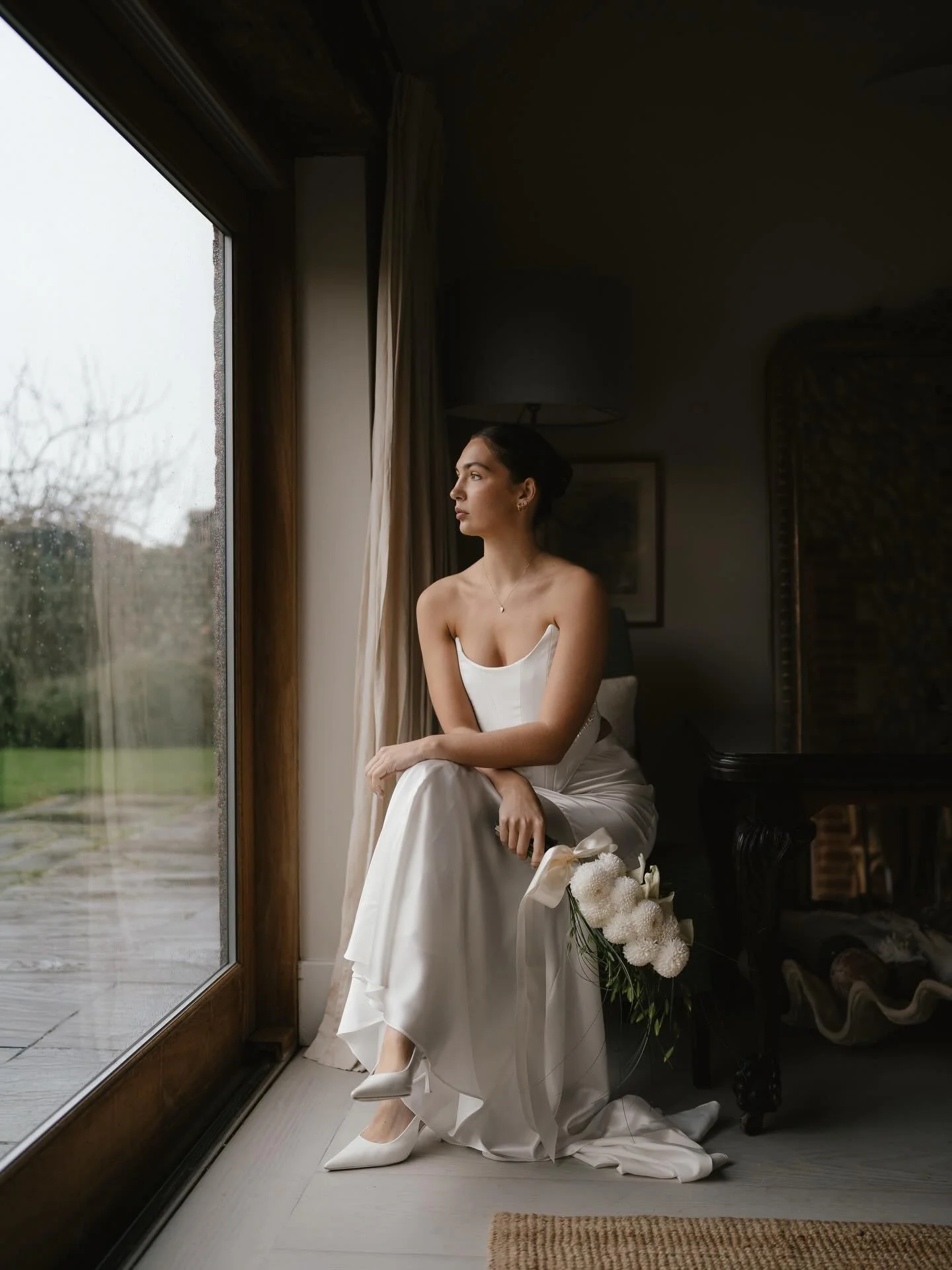 Chic, modern, and timeless ~ reimagining the all white bouquet. 

Clean, crisp, and calm whites for the bride who wants a simple bouquet with a modern twist. Perfect for an intimate elopement with sentiment. 

Calla Lillies for modesty 
Chrysanthemum