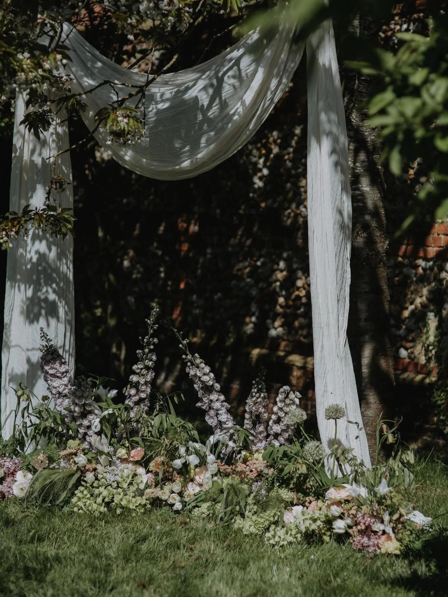 Ceremony to reception 

Repurposing ceremony flowers for your reception is the best way to make the most of your budget, but also create continuity. For this gorgeous outdoor ceremony we repurposed the meadow boxes to surround the cake table and crea