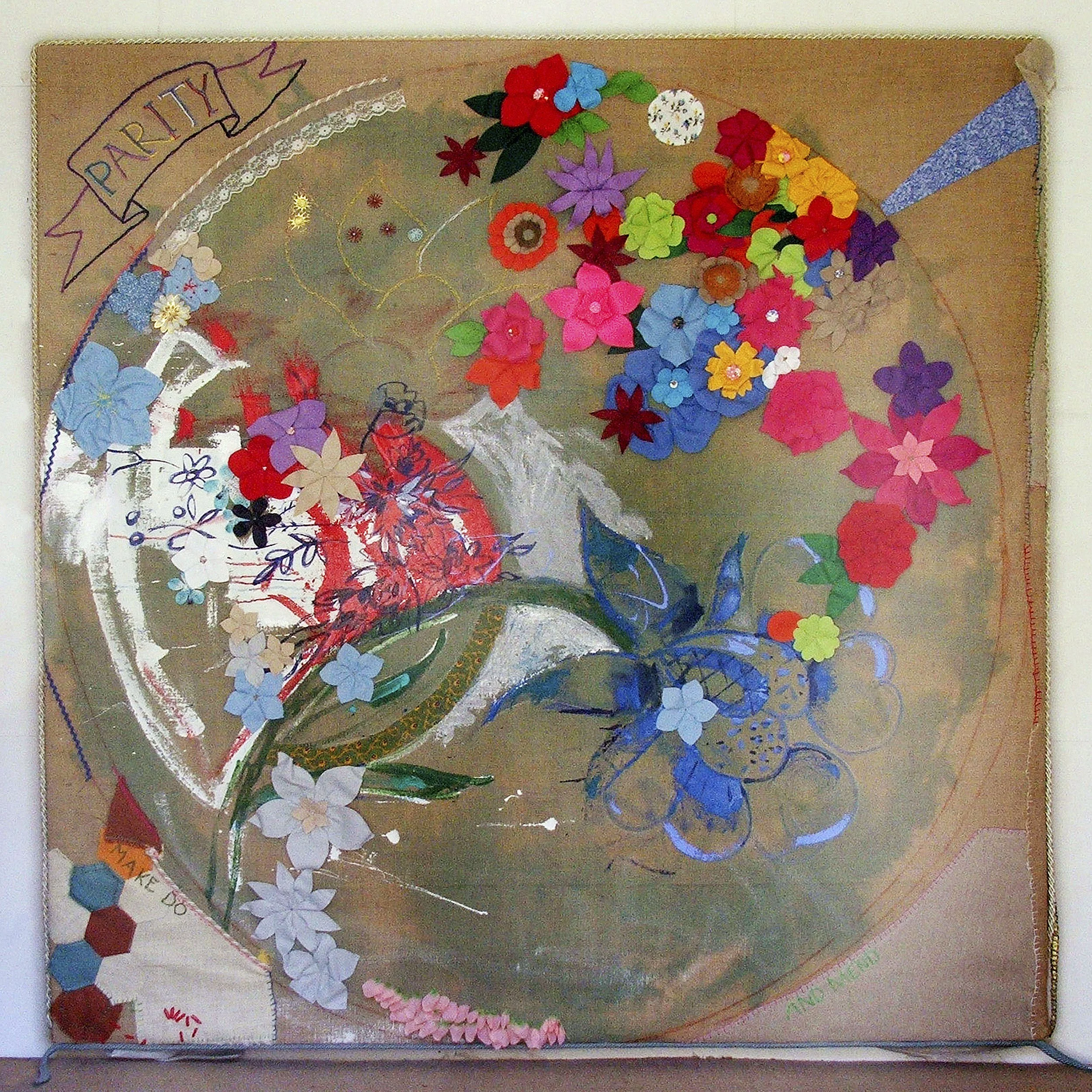 Flower Bed - large textile artwork of abstract flowers, fabrics and lettering on a hessian background