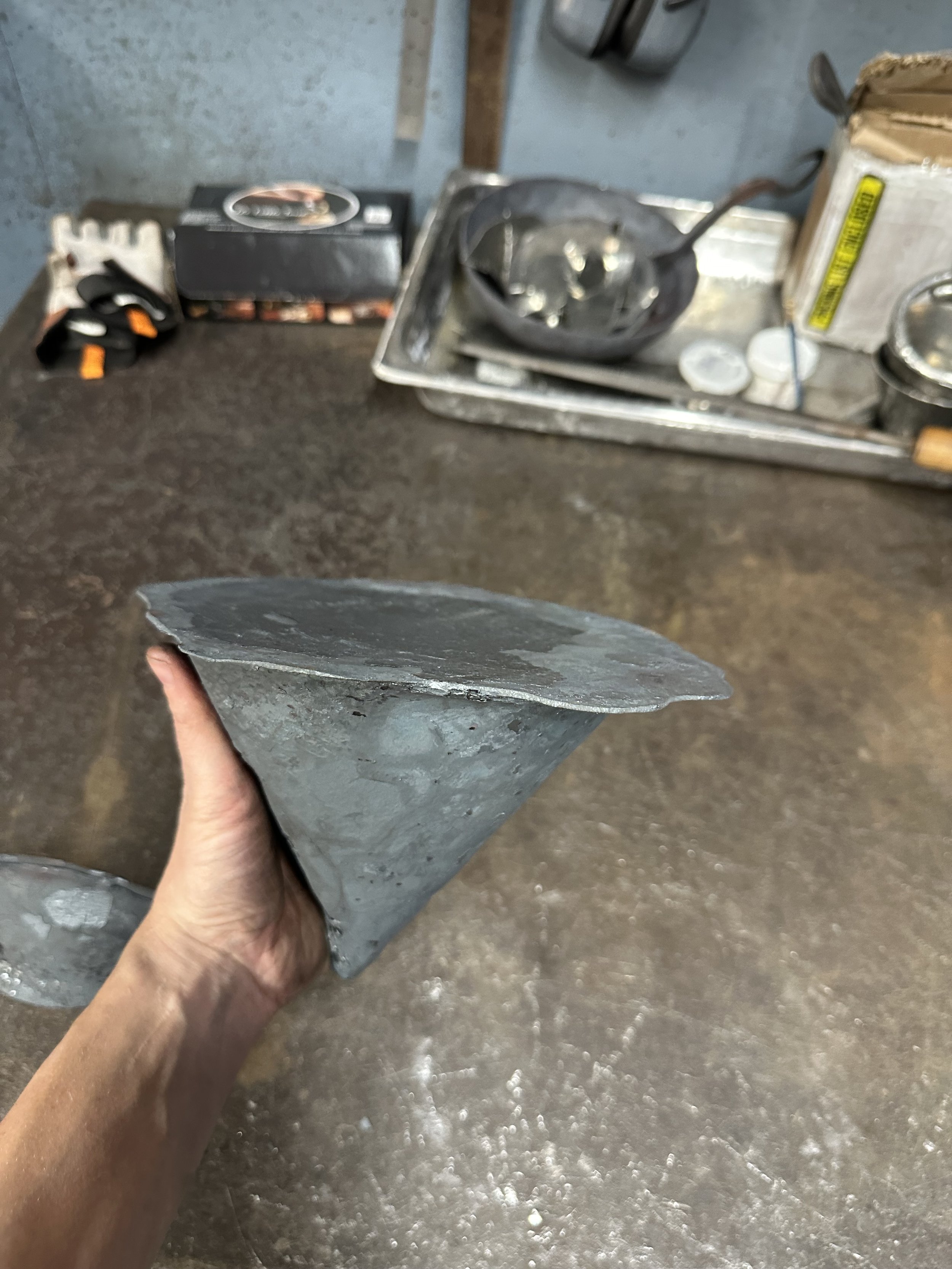 Formed steel shelf mushroom