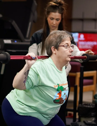 Patient working with a provider at a sports physical therapy clinic in Rhinelander, WI