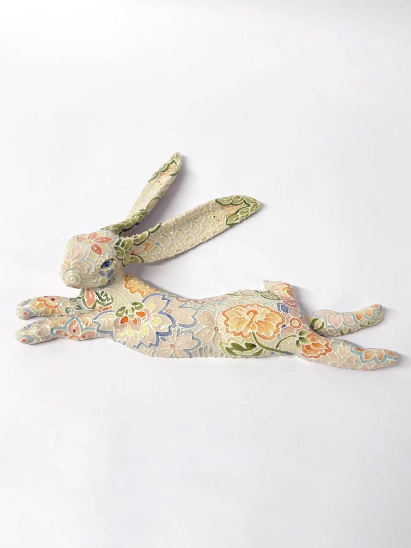 Porcelain hand-built hare with grolleg porcelain slip-trailing and hand-painted underglaze. 2026