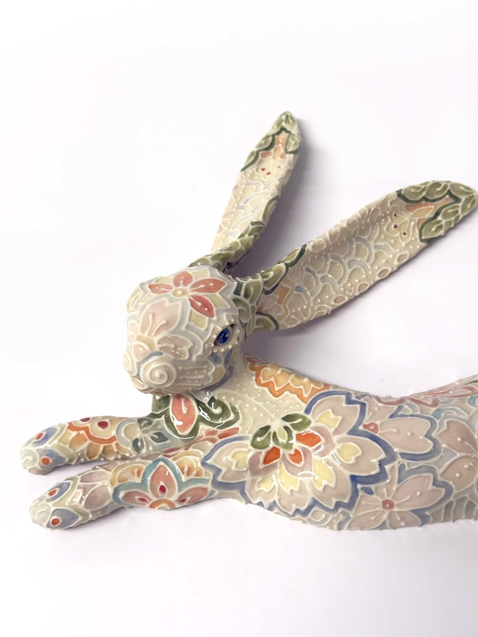 Porcelain hand-built hare with grolleg porcelain slip-trailing and hand-painted underglaze. 2026
