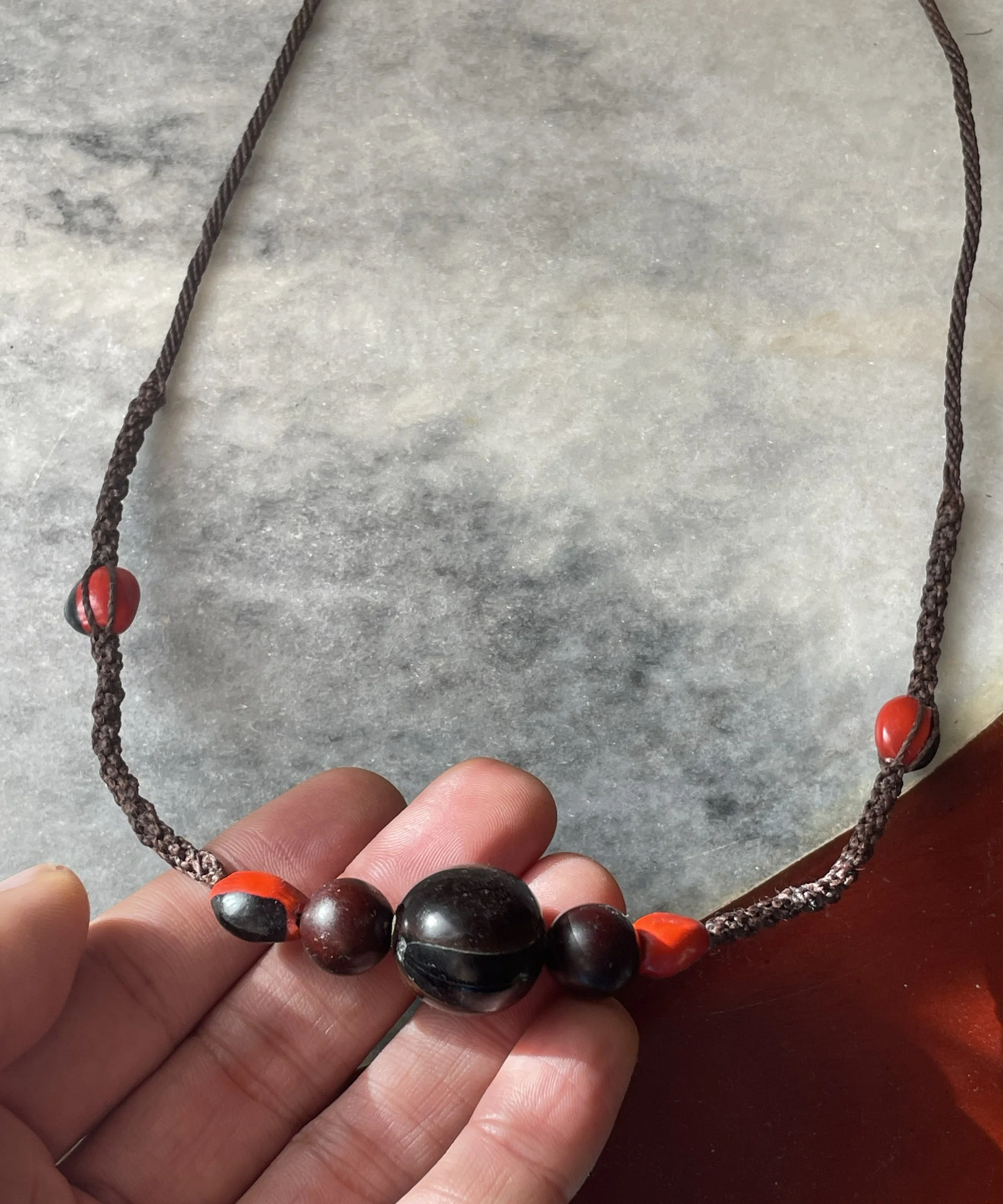 ojo de venado y huayruro hunters necklace.jpg
