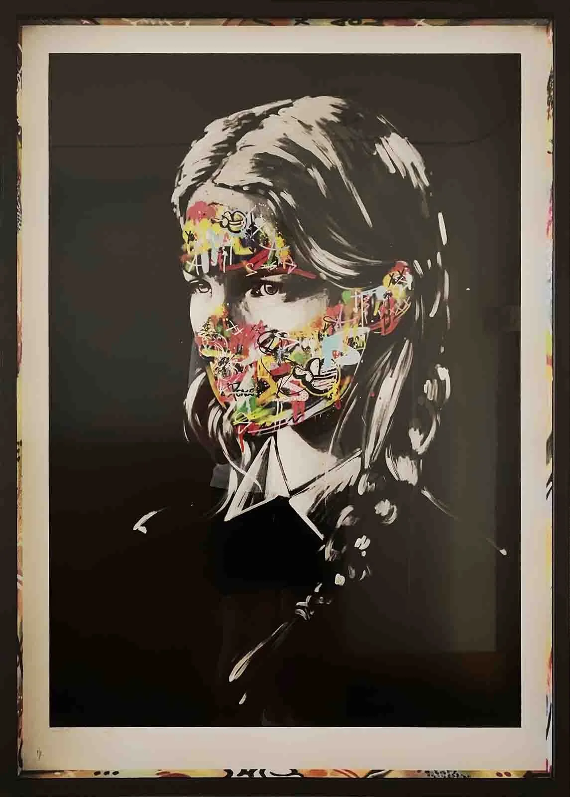 Street art portrait, framed in simple black gallery frame with custom painted spacers to match graffiti styling.