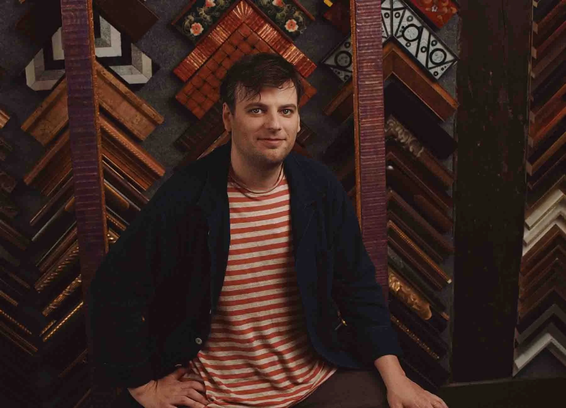 A portrait photograph of Robert "Mangoe" Jones, owner of Mangoe Arts & Framing at Houston Station in Nashville, TN.