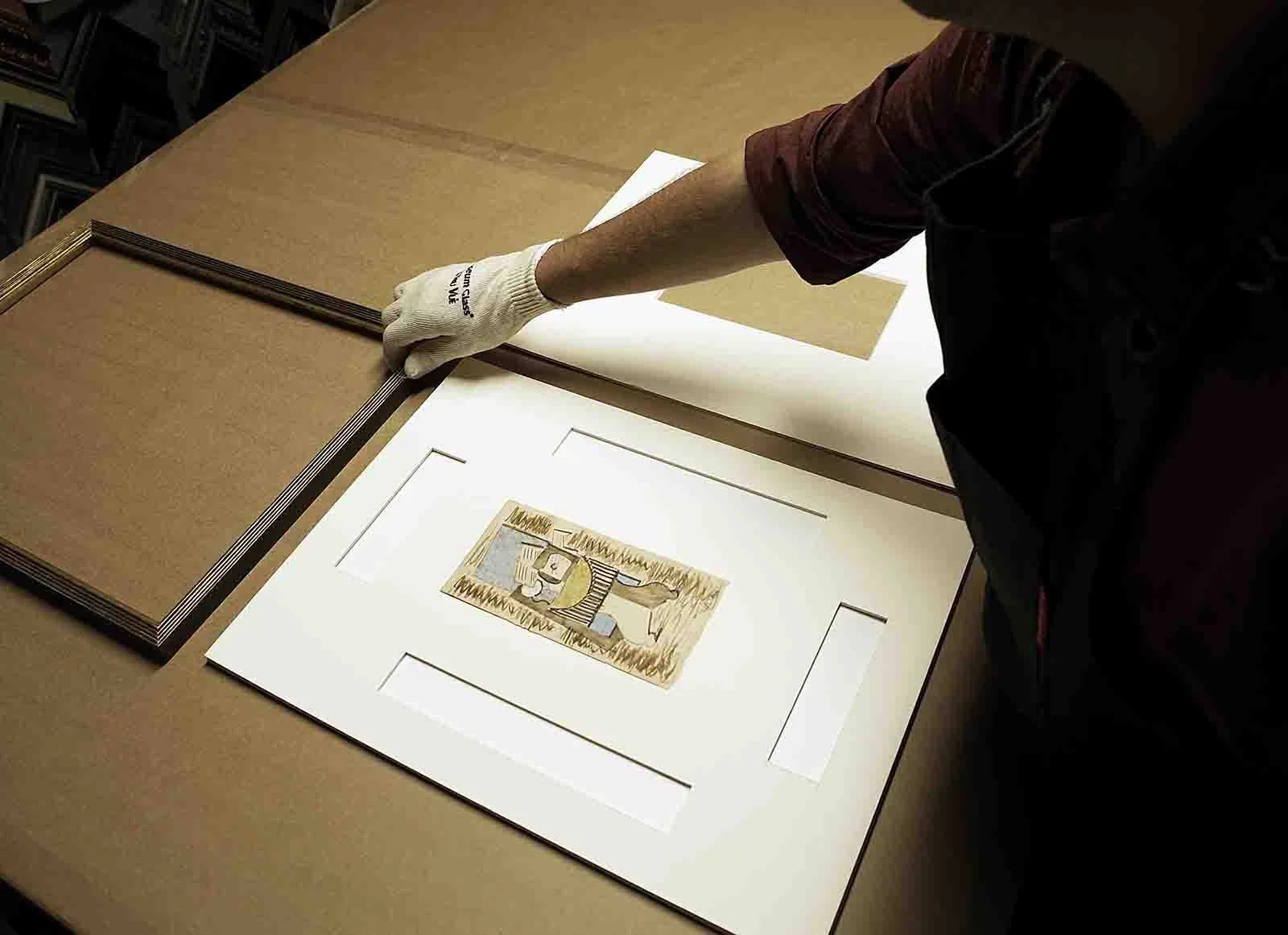 Custom conservation framing of an original Picasso gouache on paper, using cotton rag matting, artsorb moisture control, rice starch adhesive, and optium museum acrylic. Framed at Mangoe Arts in Nashville, TN..