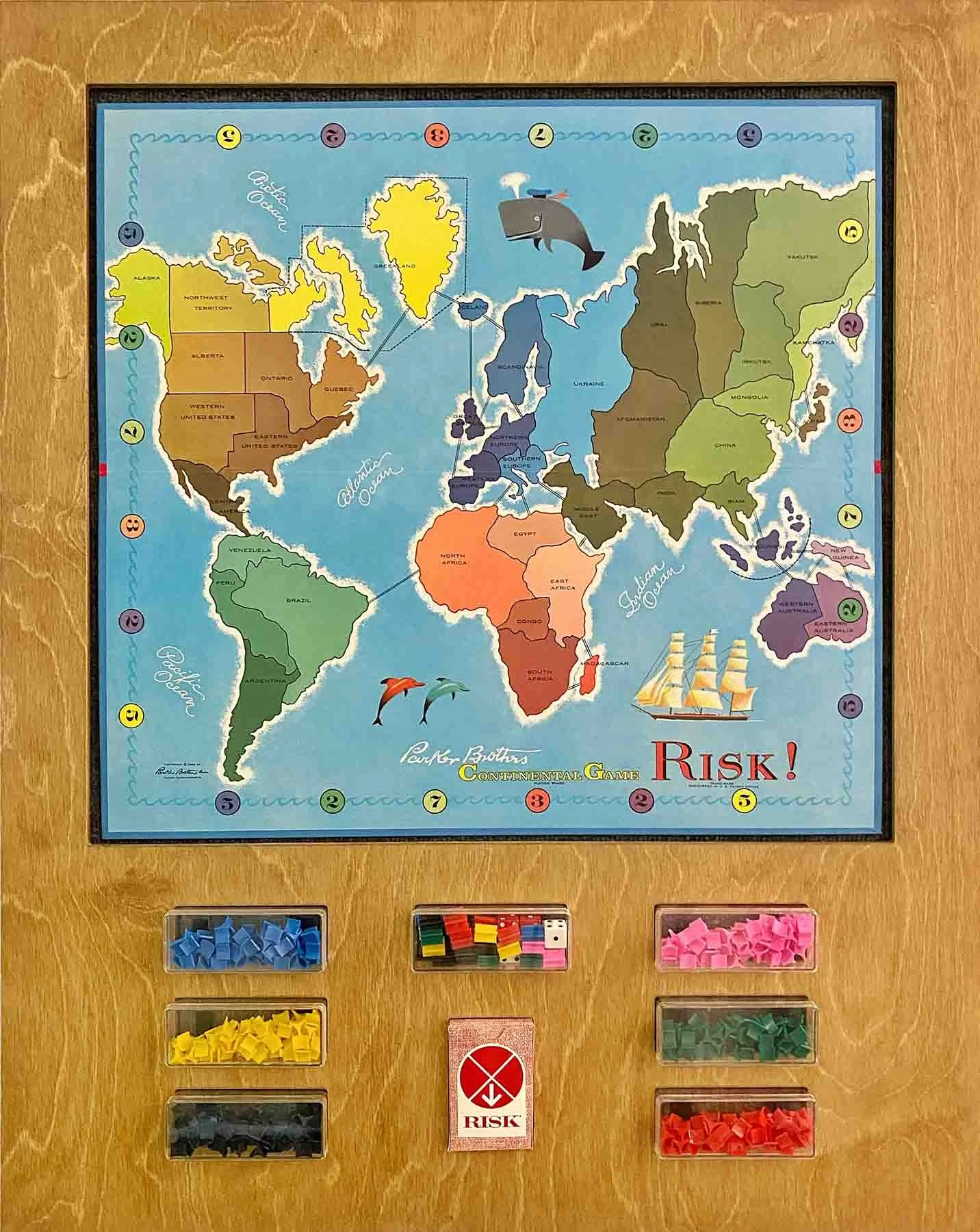 Custom wall mounted box, displaying vintage Risk board game. Accessible with velcro on fabric backing.