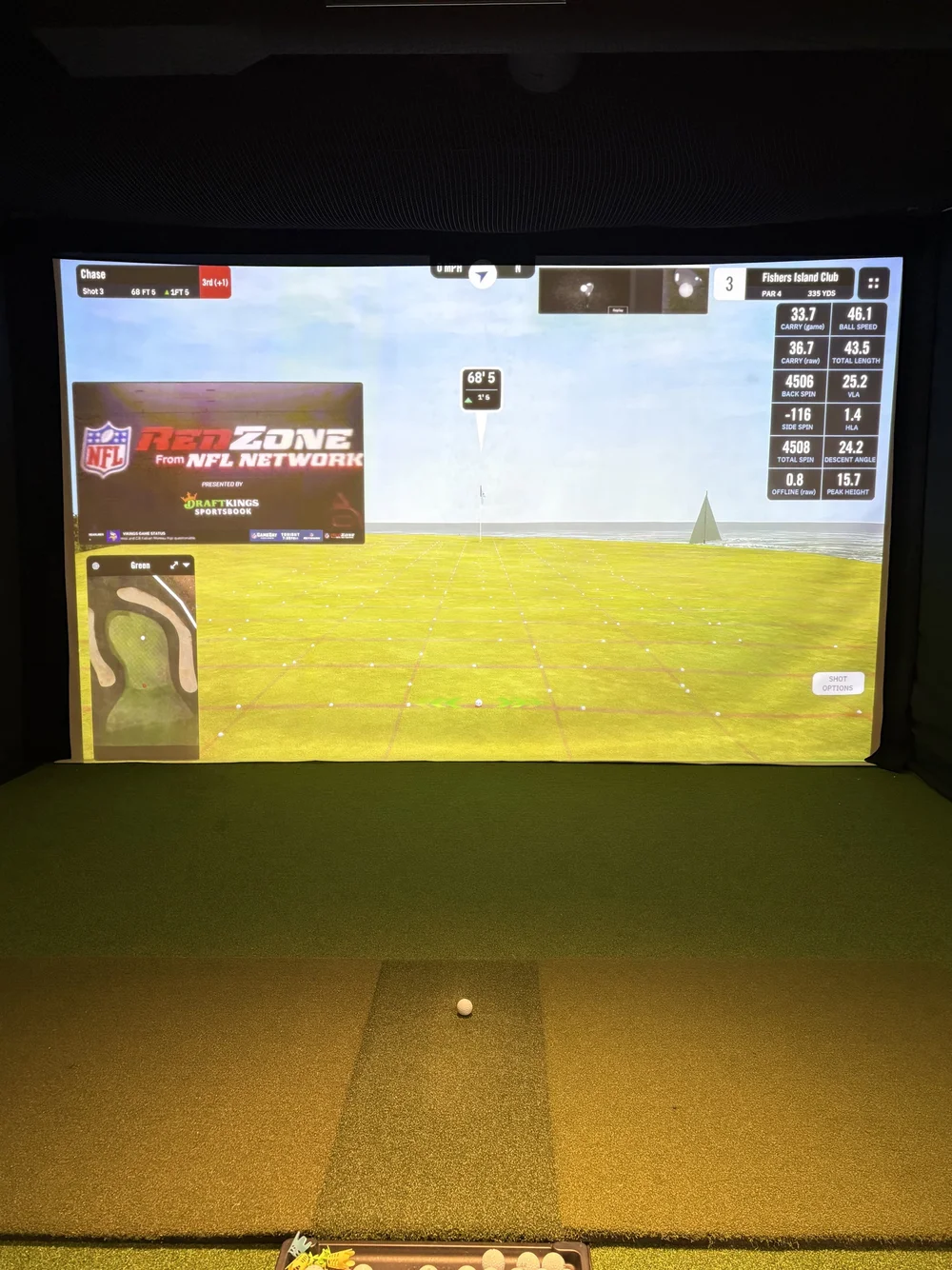 A golf course on the simulator screen at Mulligan's Indoor Golf
