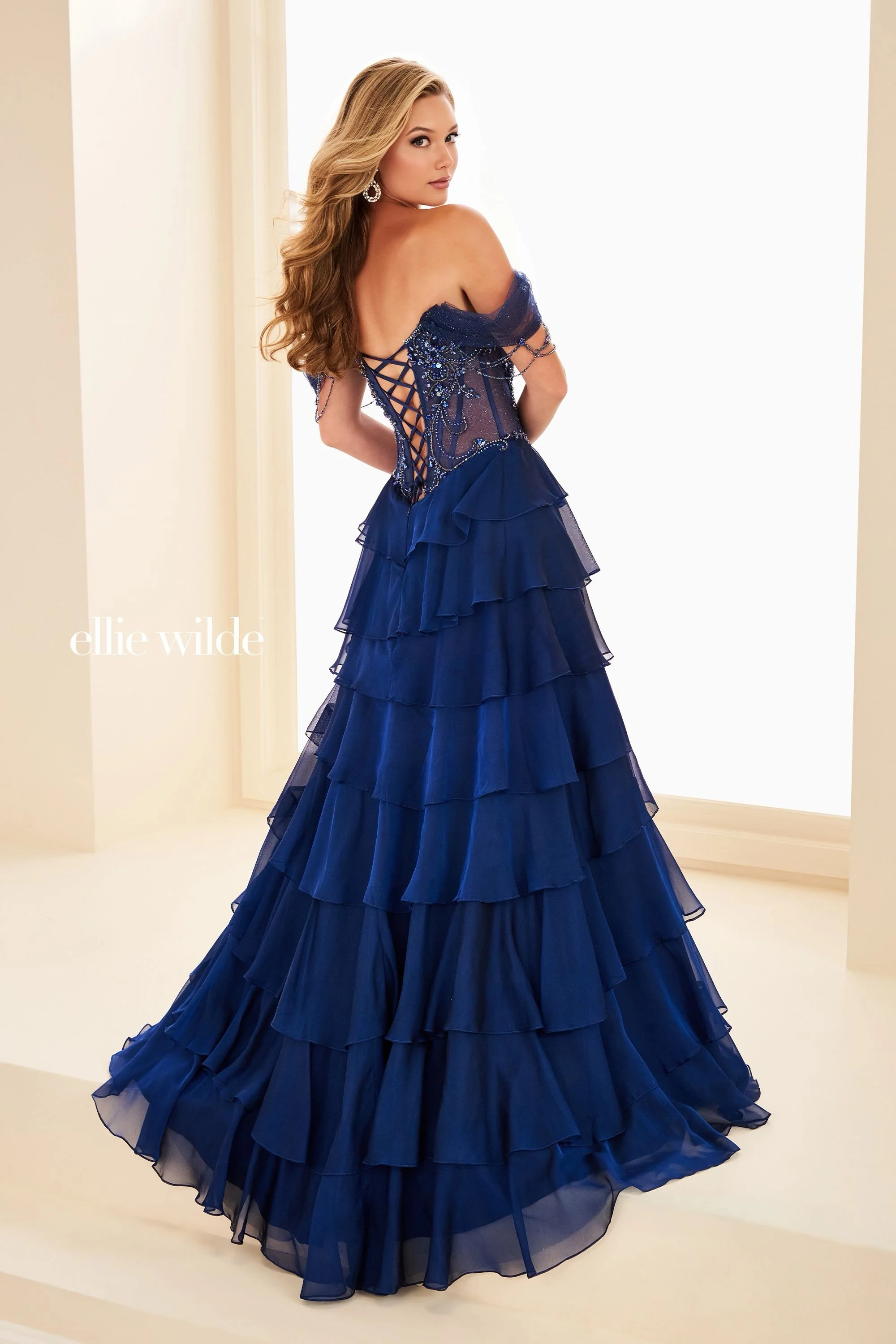 Ellie Wilde EW37018 off the shoulder A-line with ruffles and sheer bodice with embellishments