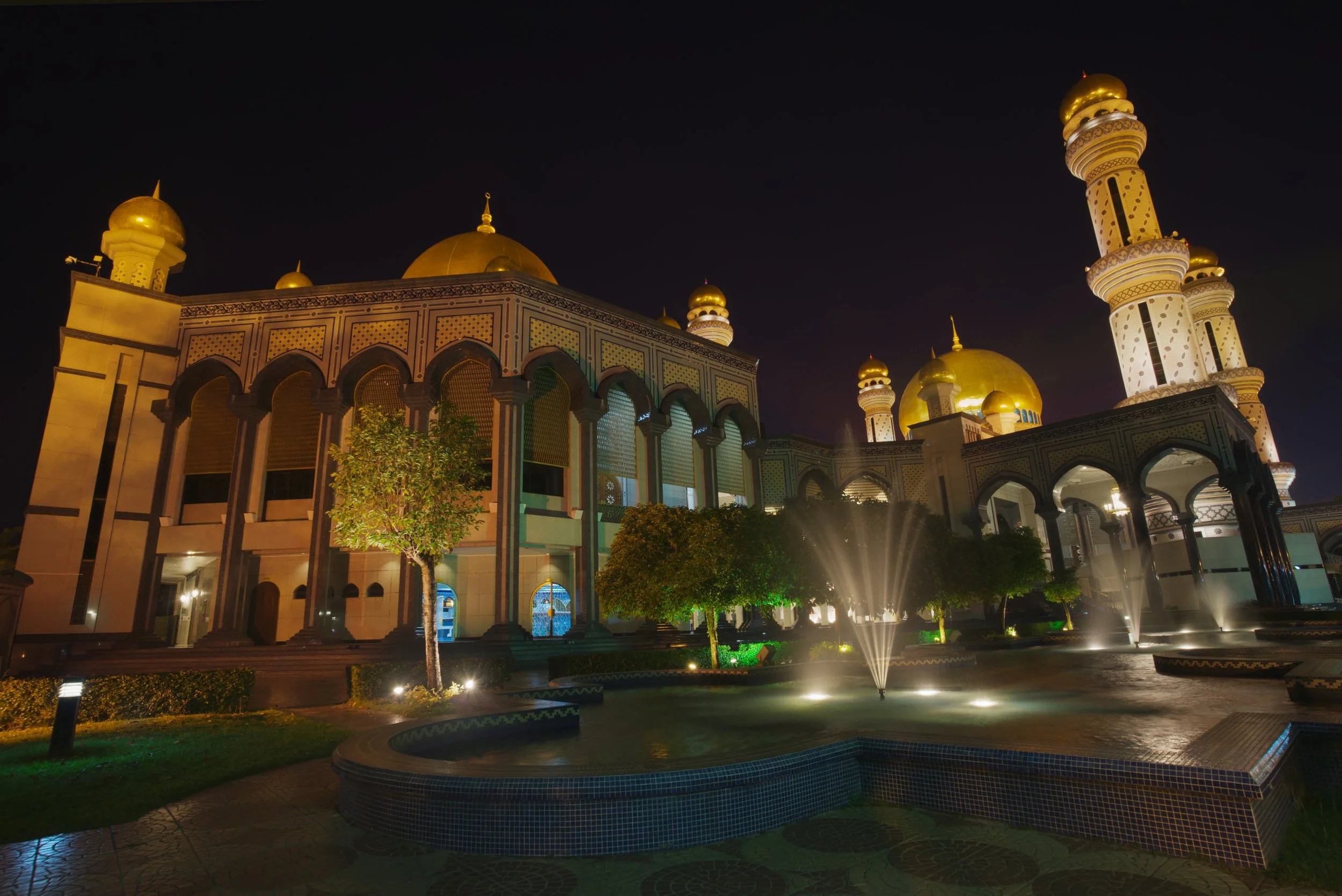 Long exposure photo of Jame' Asr Hassanil Bolkiah Mosque in Bandar Seri Begawan, Brunei, at night.