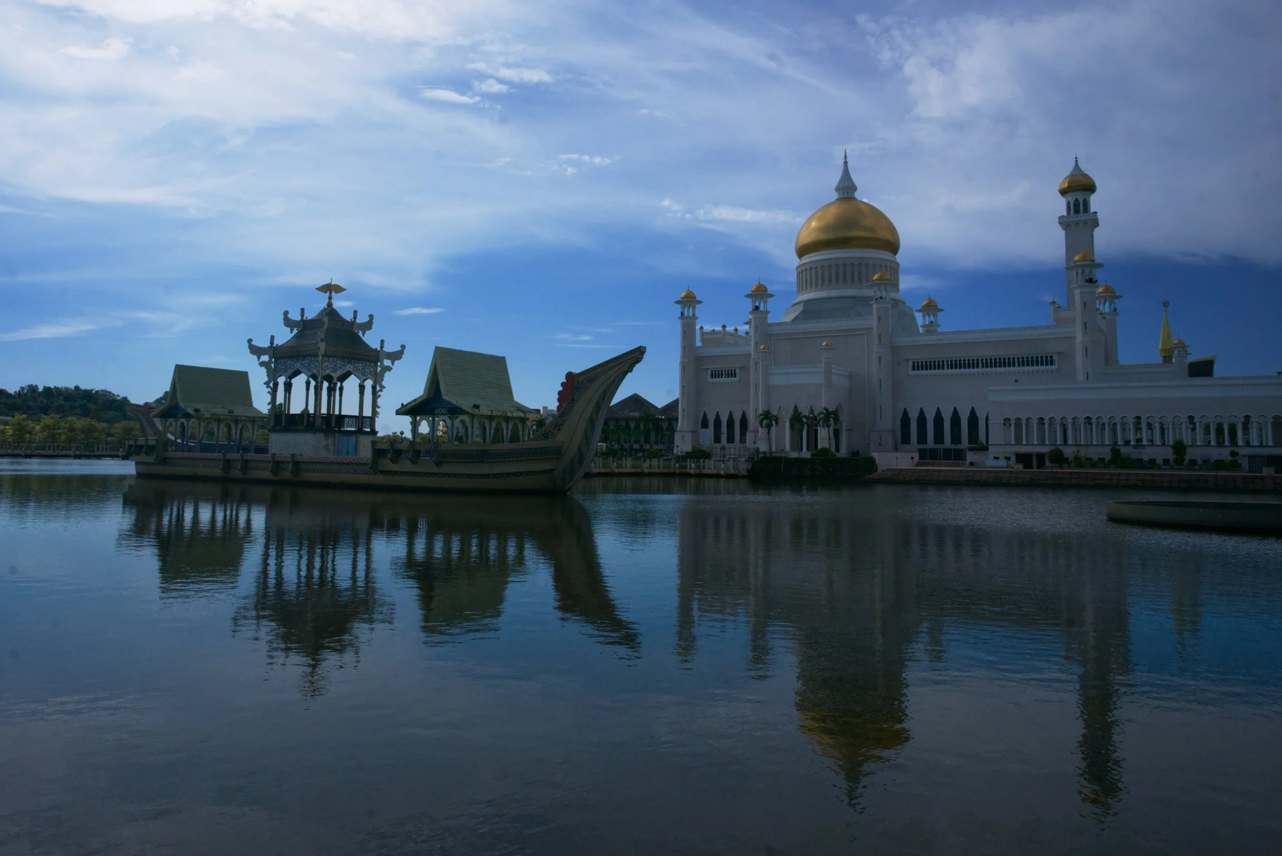 Omar 'Ali Saifuddien Mosque in Bandar Seri Begawan, Brunei, reflected in the water of a lake.