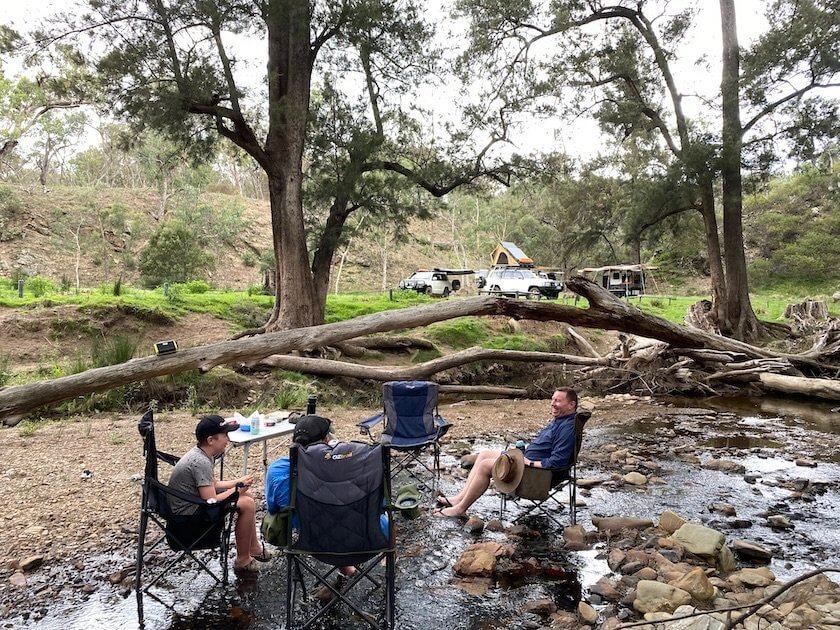 People relaxing in creek in Abercrombie River National Park