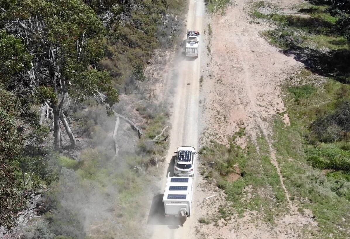 Two vehicles towing trailers in Abercrombie River National Park
