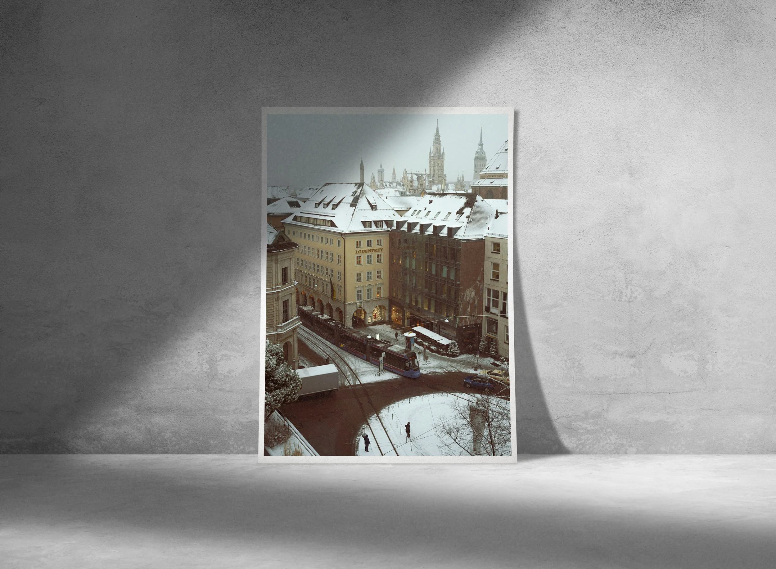 Train passing through snowcapped Munich