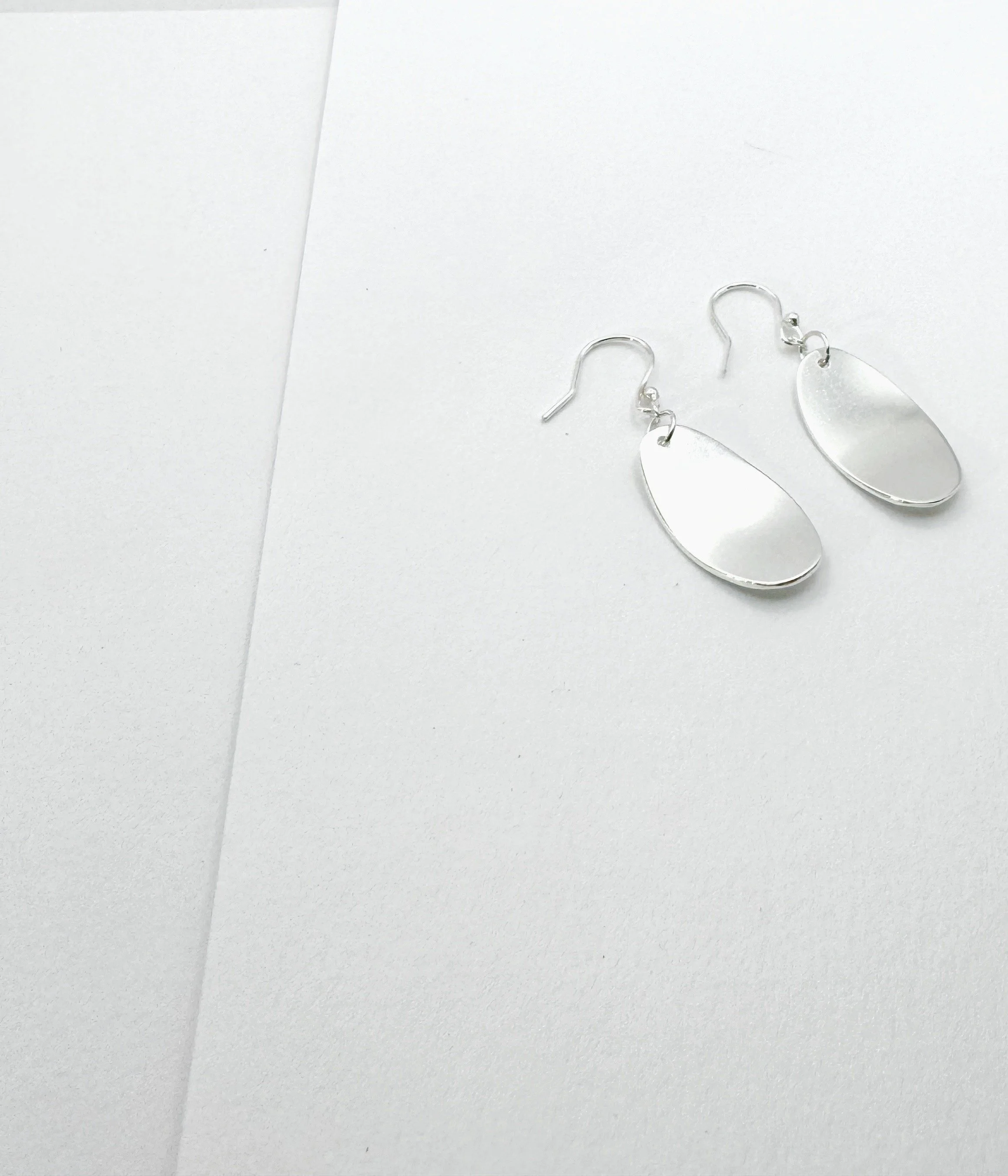 Sterling silver domed oval earrings