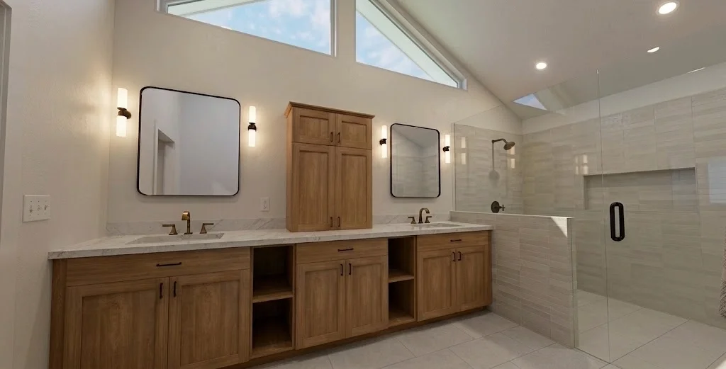 Open primary bathroom with big windows in the peak of a vaulted ceiling, with light white and grey tiel in shower, big white carrera floortiles, wood cabinets