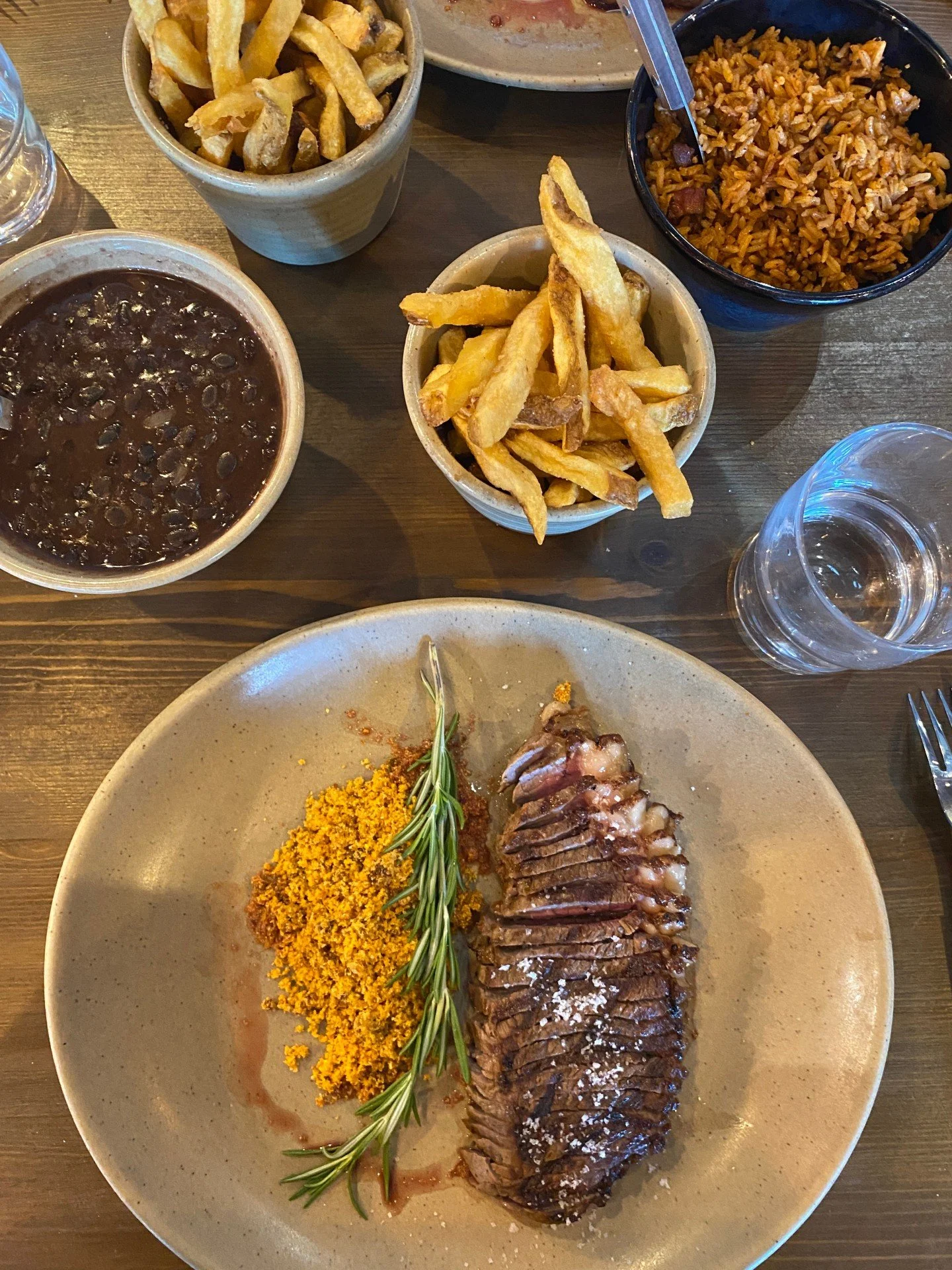 Why churrasqueiras are brilliant for families in Portugal 🇵🇹🍗

If you're travelling to Portugal with kids, let me share a little secret: skip the tourist traps and head straight to your nearest churrasqueira.

What's a churrasqueira?
It's a tradit