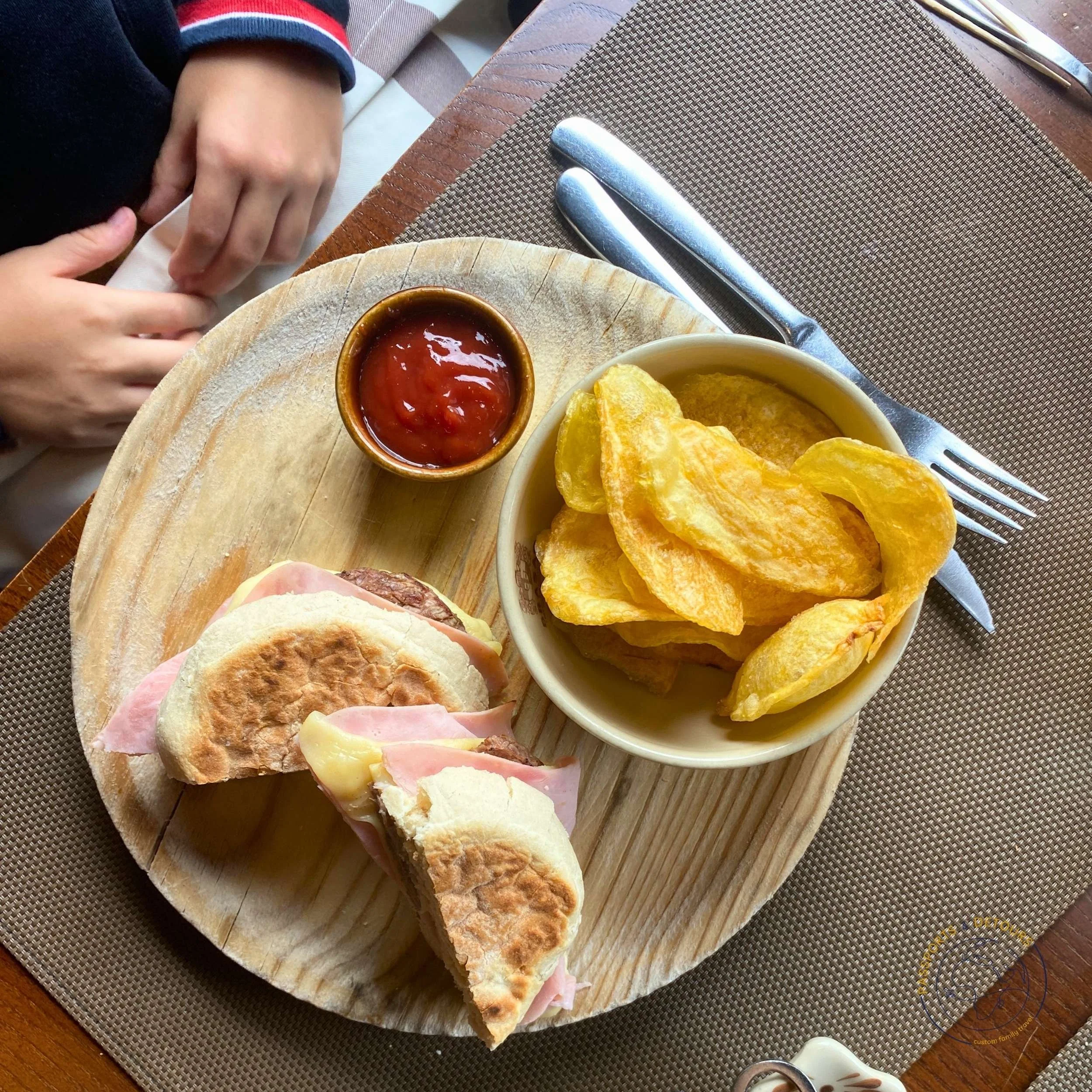 Family dining at a local restaurant in Porto Portugal with children